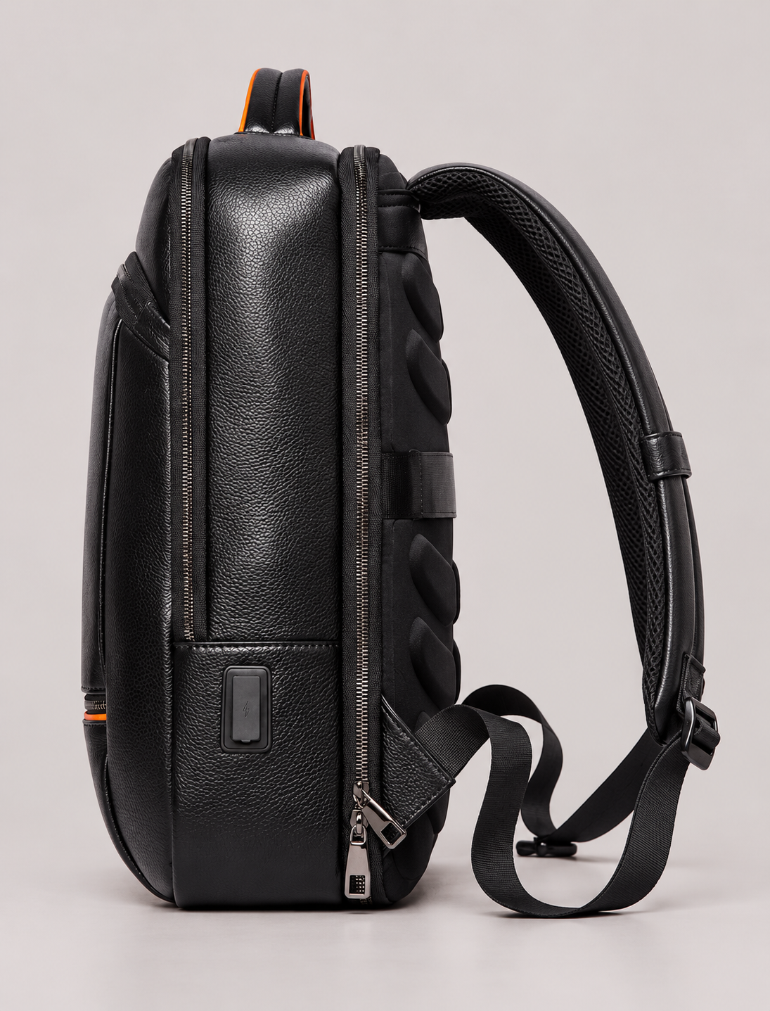 Side-Profile Black Leather Backpack.png