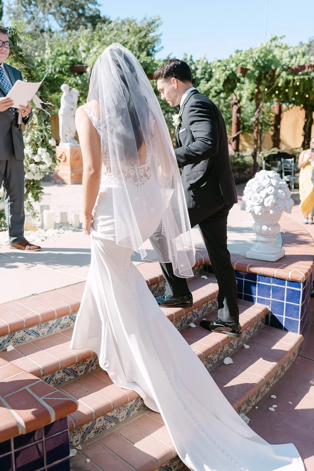 Outdoor CA winery wedding ceremony with mediterranean style