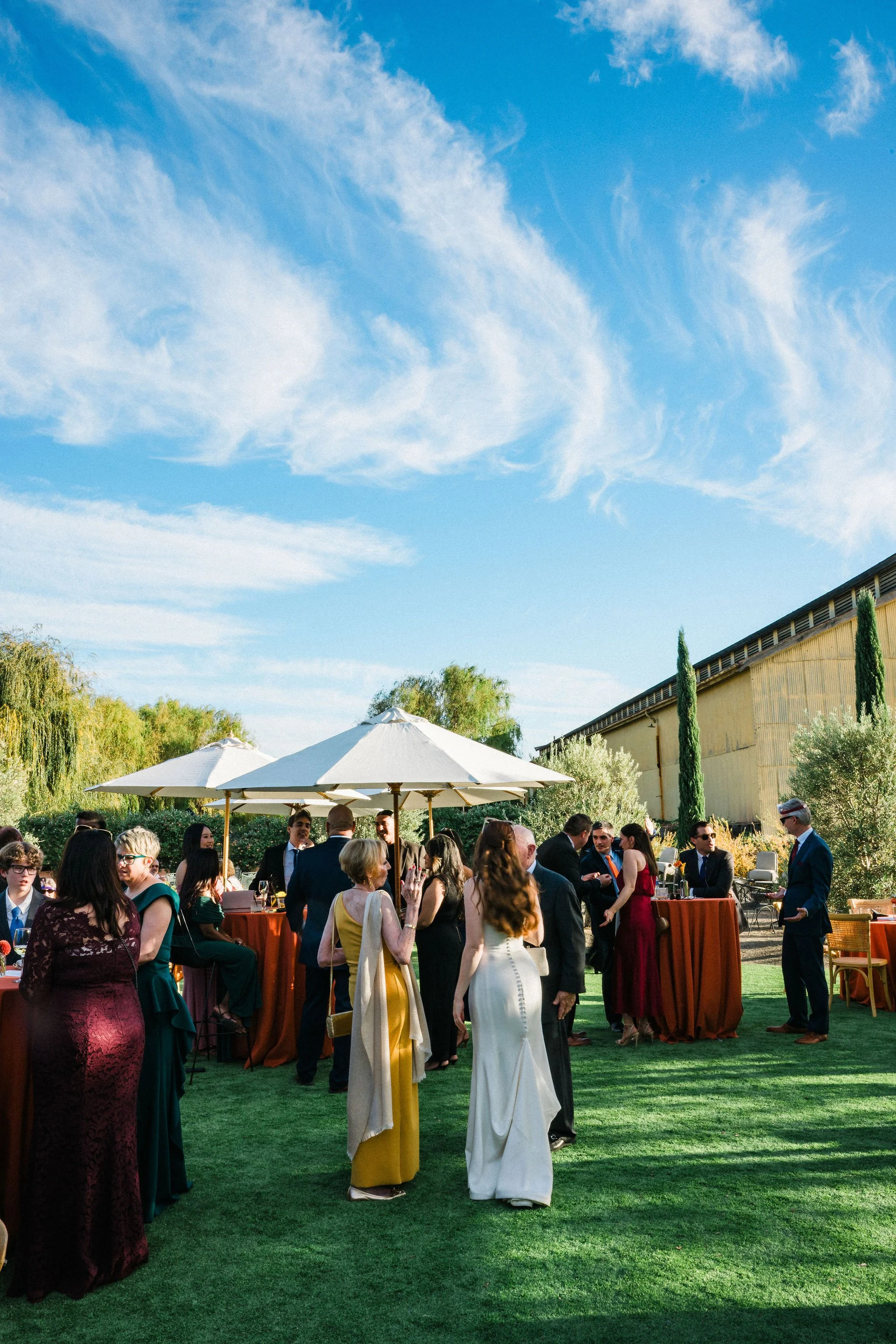 Outdoor wedding cocktail hour by Sacramento river at Willow Ballroom