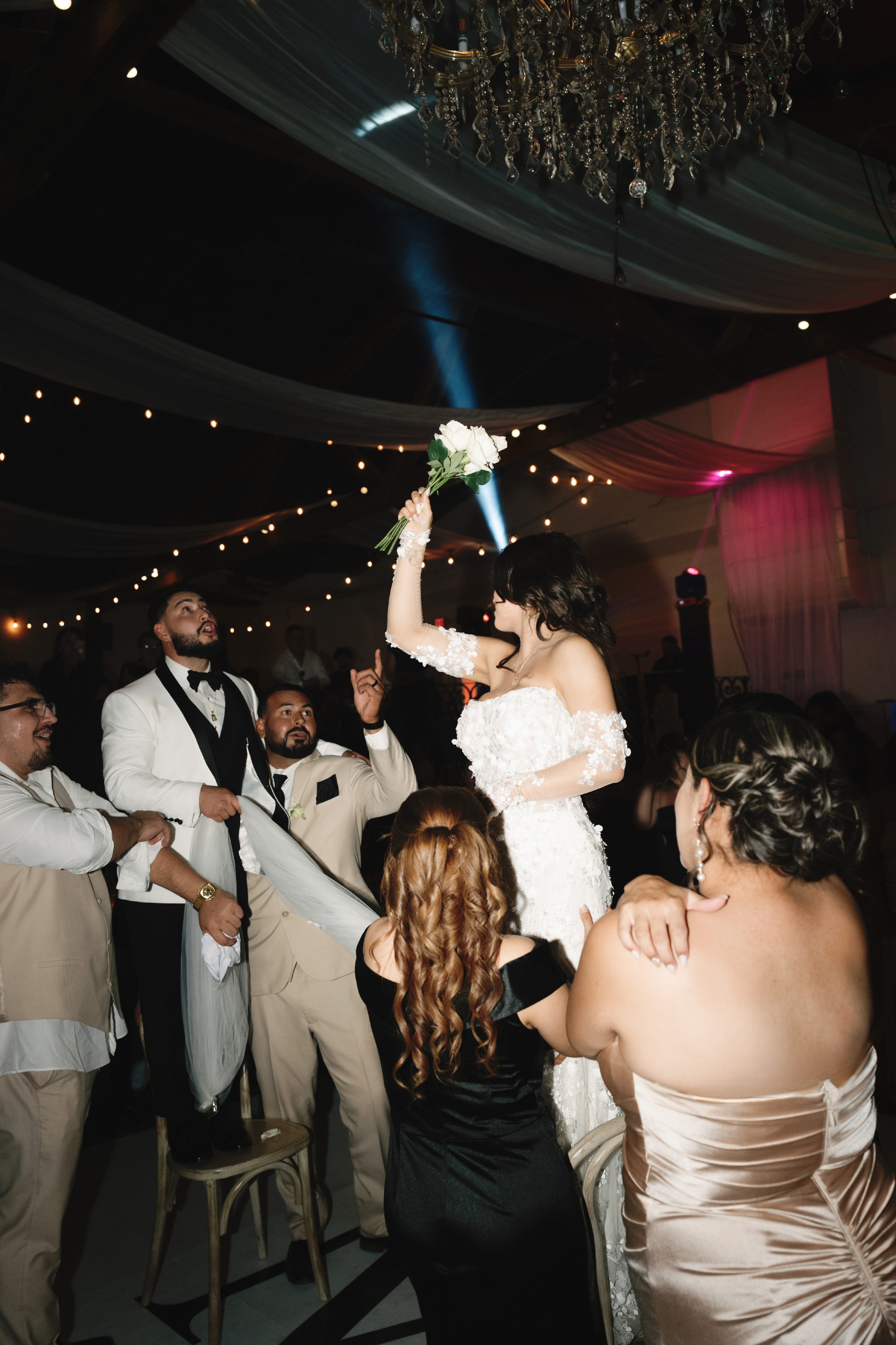 Bouquet toss wedding reception at winery wedding venue in CA