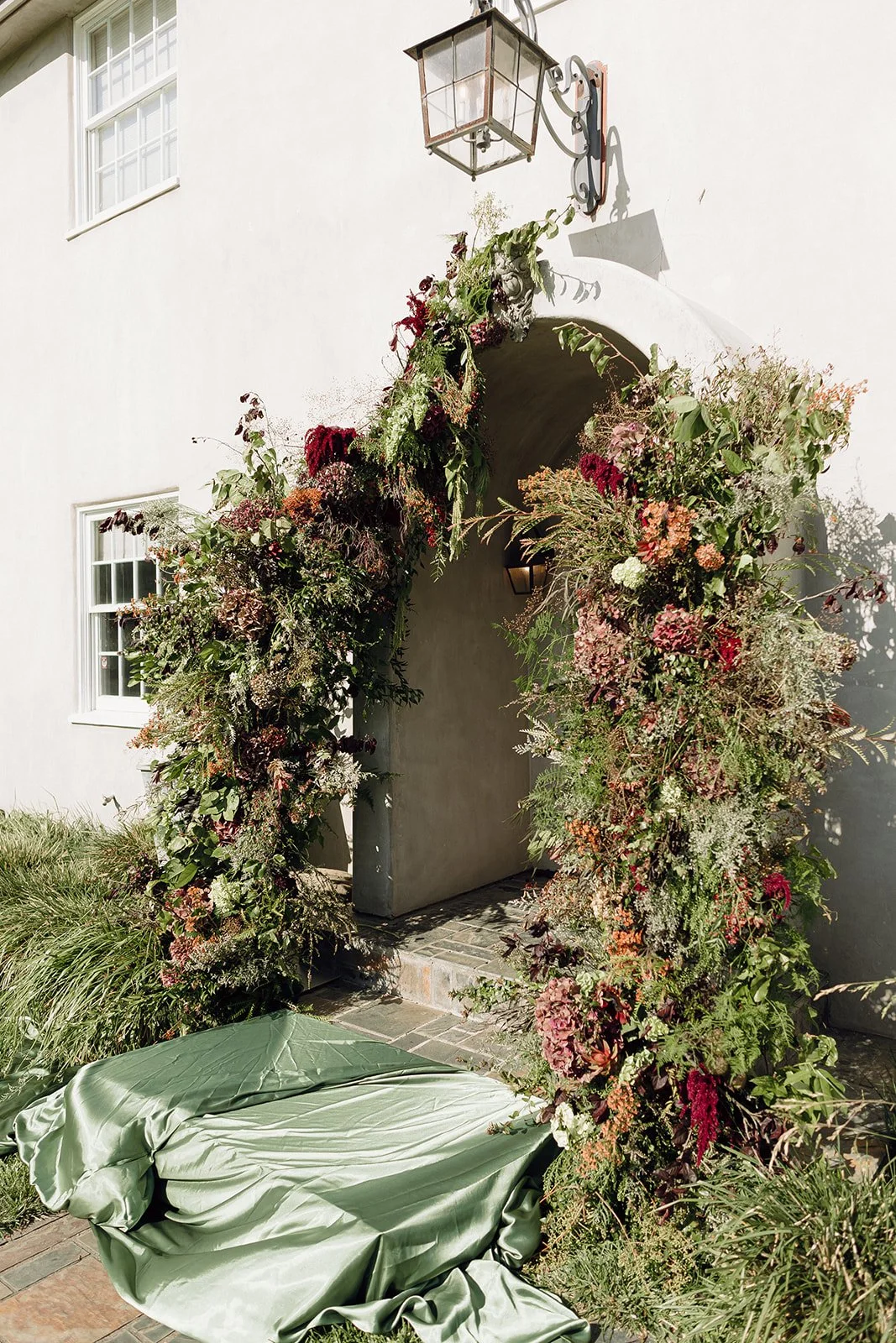 Wedding ceremony floral arch at Cavaignac wedding venue in Walnut Grove, CA 
