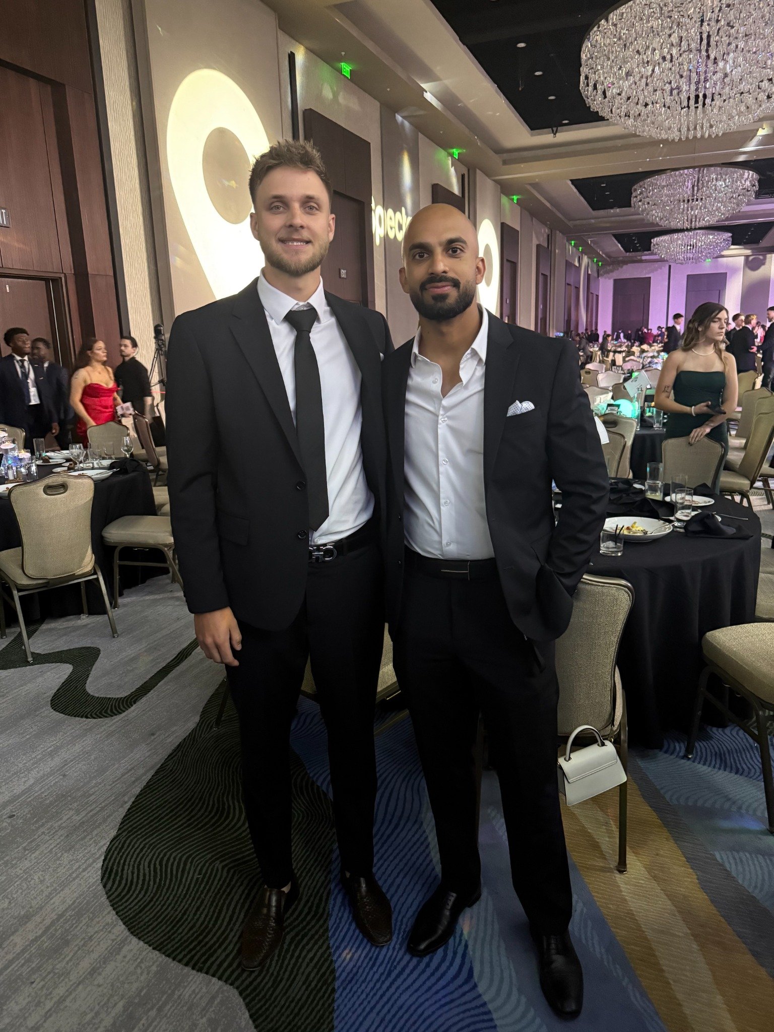 Grit team members connecting at a leadership event