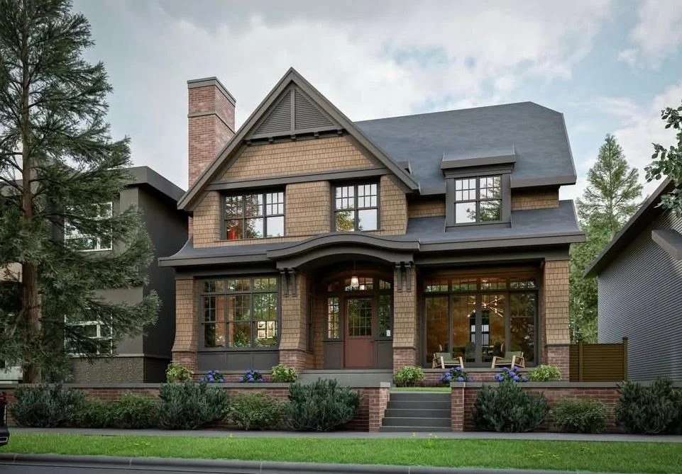 A large, two-story house with a gabled roof, brick exterior, and large front windows, surrounded by trees and shrubs.