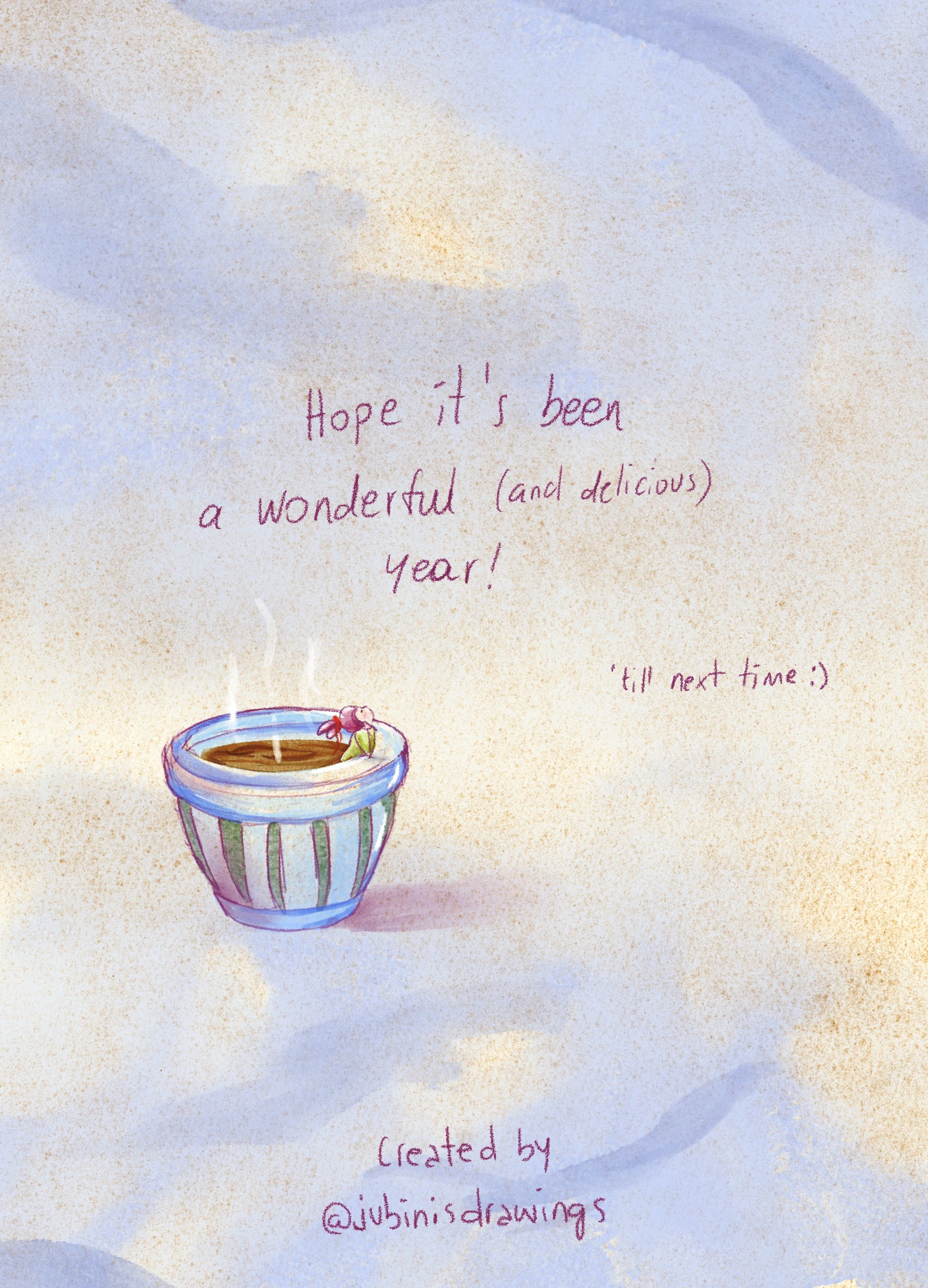 Una tazza di caffè caldo dentro un vaso blu, con una fogliolina come decorazione. Scritta a mano: «Hope it's been a wonderful (and delicious) year! 'till next time :)».