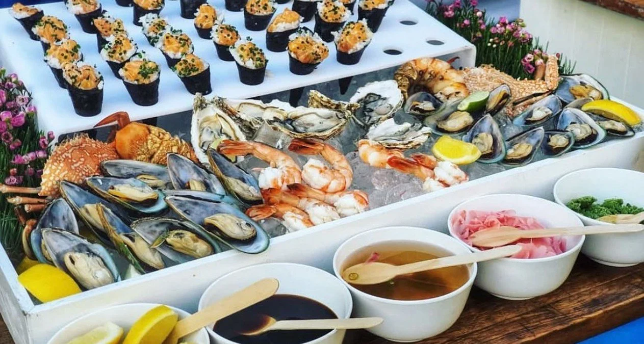 Seafood platter with oysters, prawns and canapés at a catered event