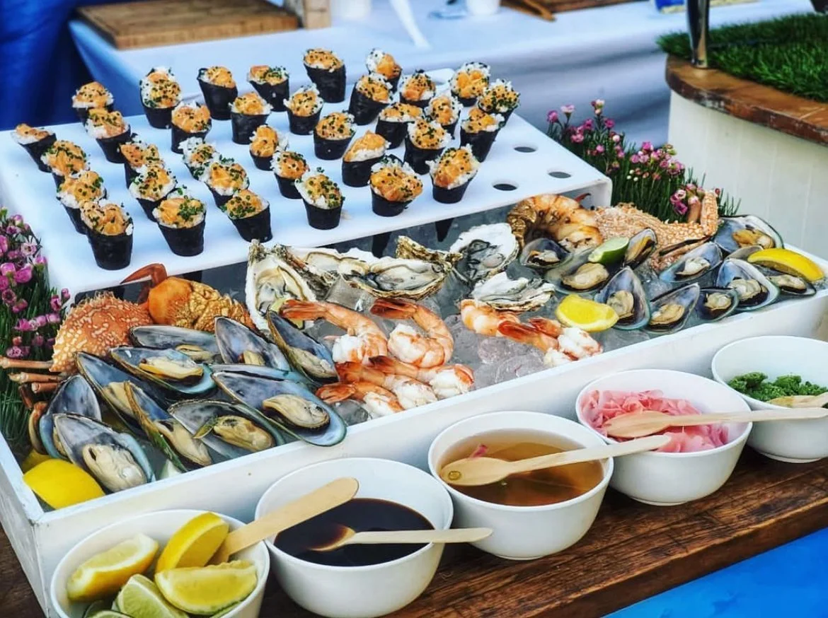 Seafood platter with oysters, prawns and canapés at a catered event