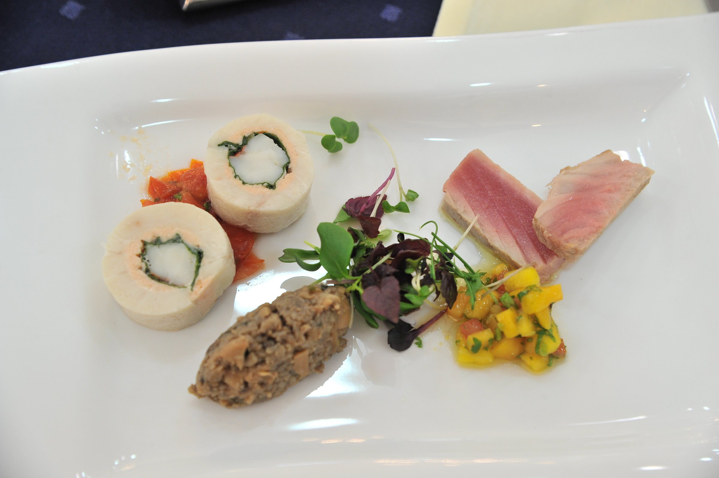 Plated terrine rolls, seared tuna and mango salsa