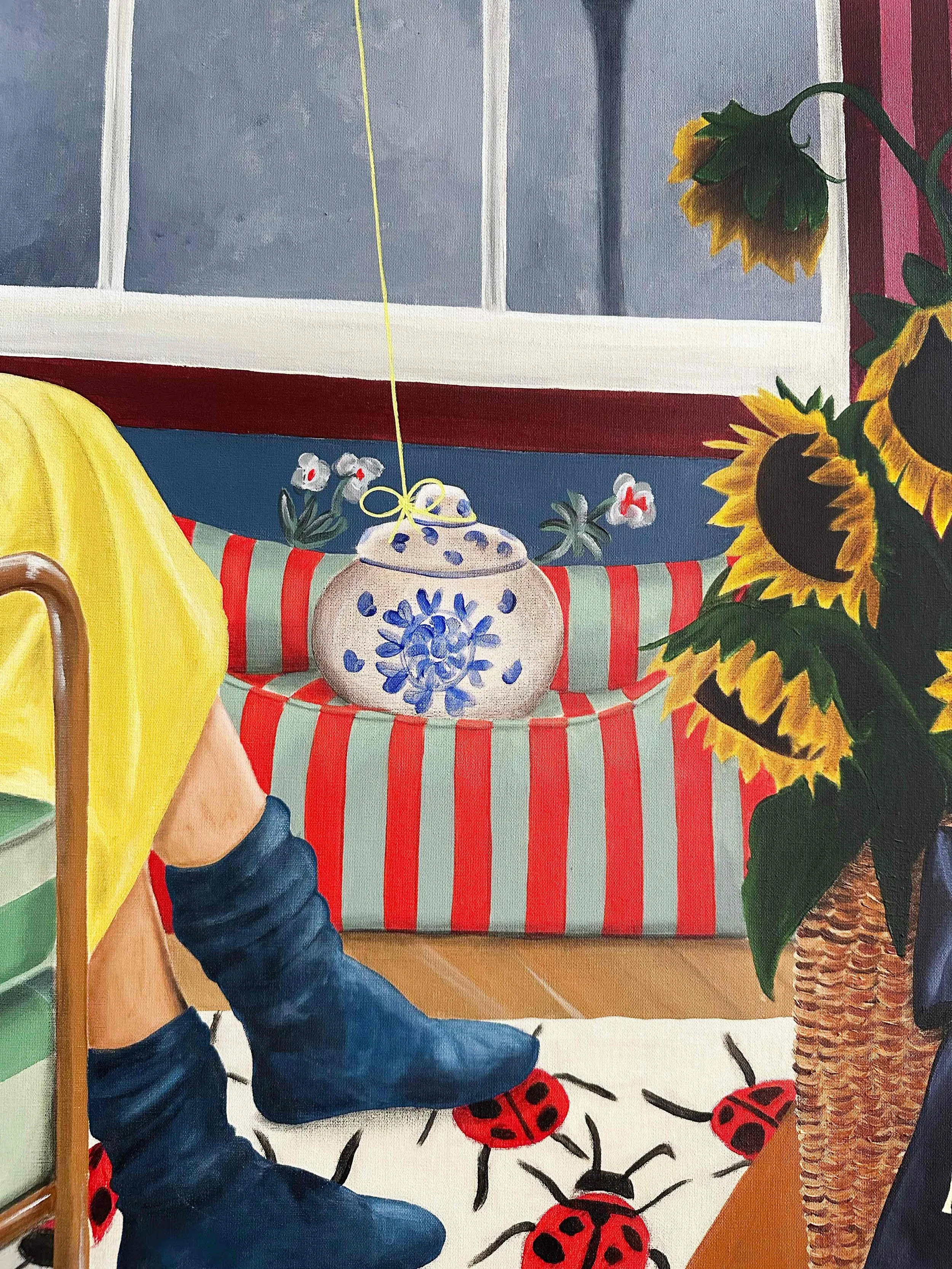 	
« Mamie si tu savais », peinture figurative de Margaux Pecorari : une femme aux cheveux gris assise dans un fauteuil, au cœur d’un intérieur coloré peuplé de coccinelles, tournesols et poteries.