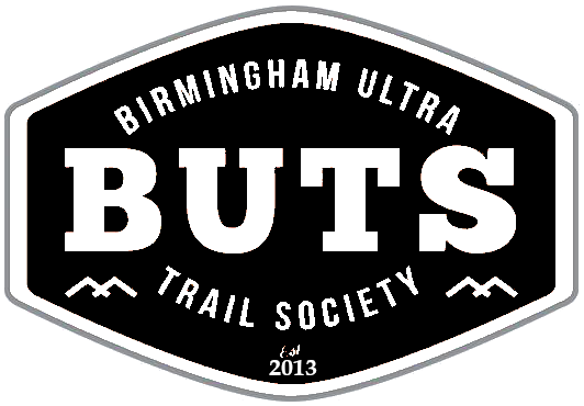 Birmingham Ultra Buts Trail Society logo with a black and white design, including the society's name and establishment year 2013.