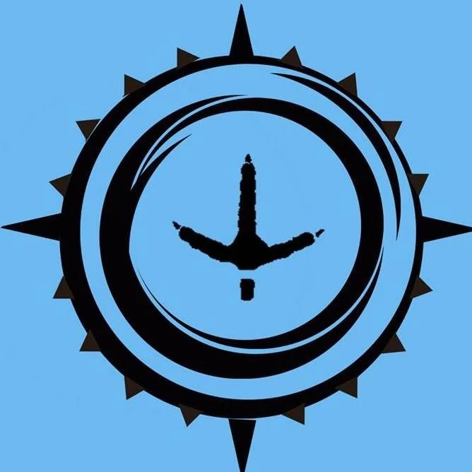 A stylized compass design with a silhouette of a person performing a handstand in the center, on a blue background.