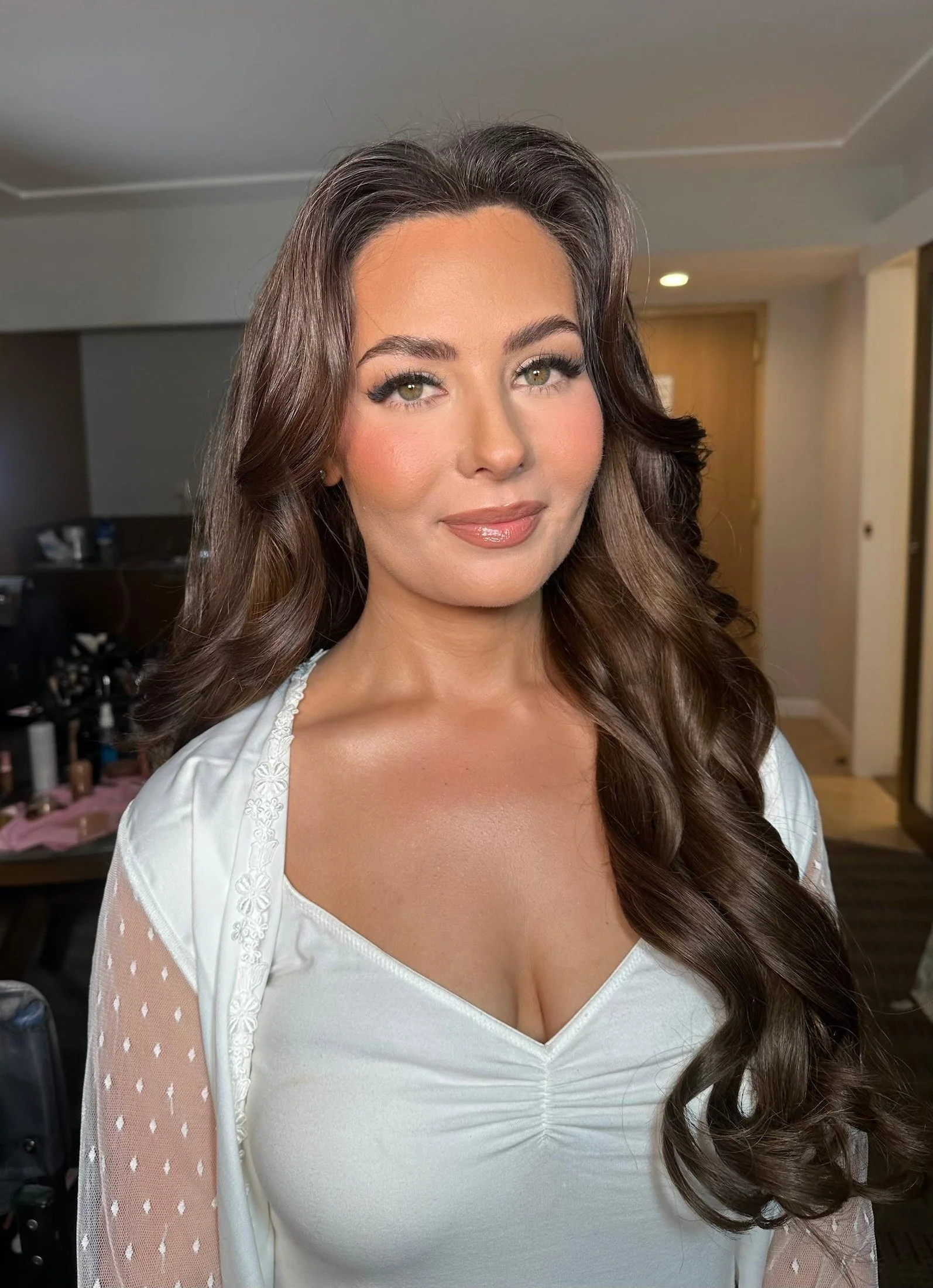 Los Angeles bridal makeup artist Jackie Romero creating soft glam wedding makeup for a bride