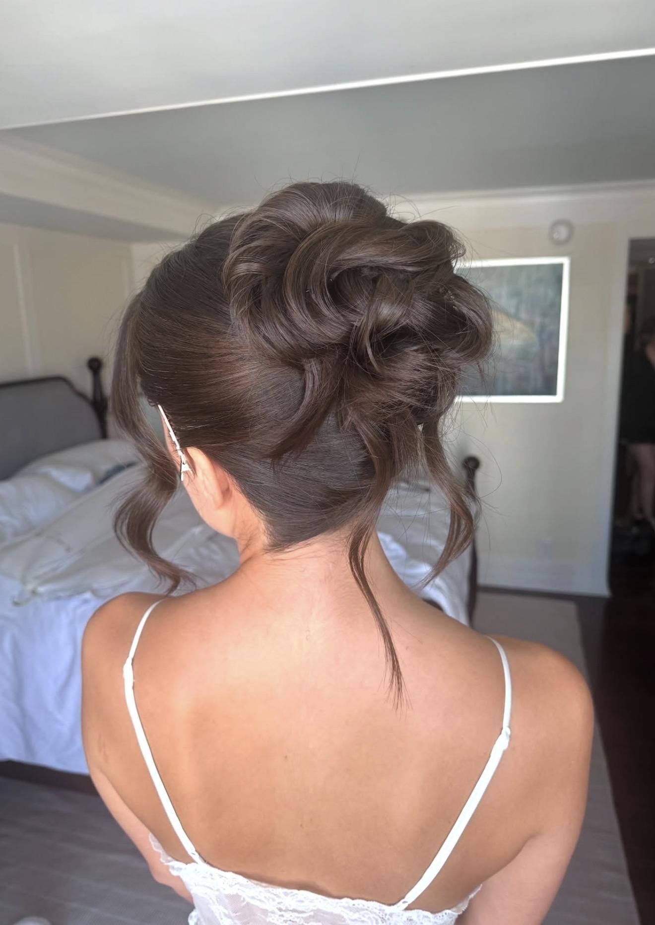 Los Angeles bridal makeup artist Jackie Romero creating soft glam wedding makeup for a bride
