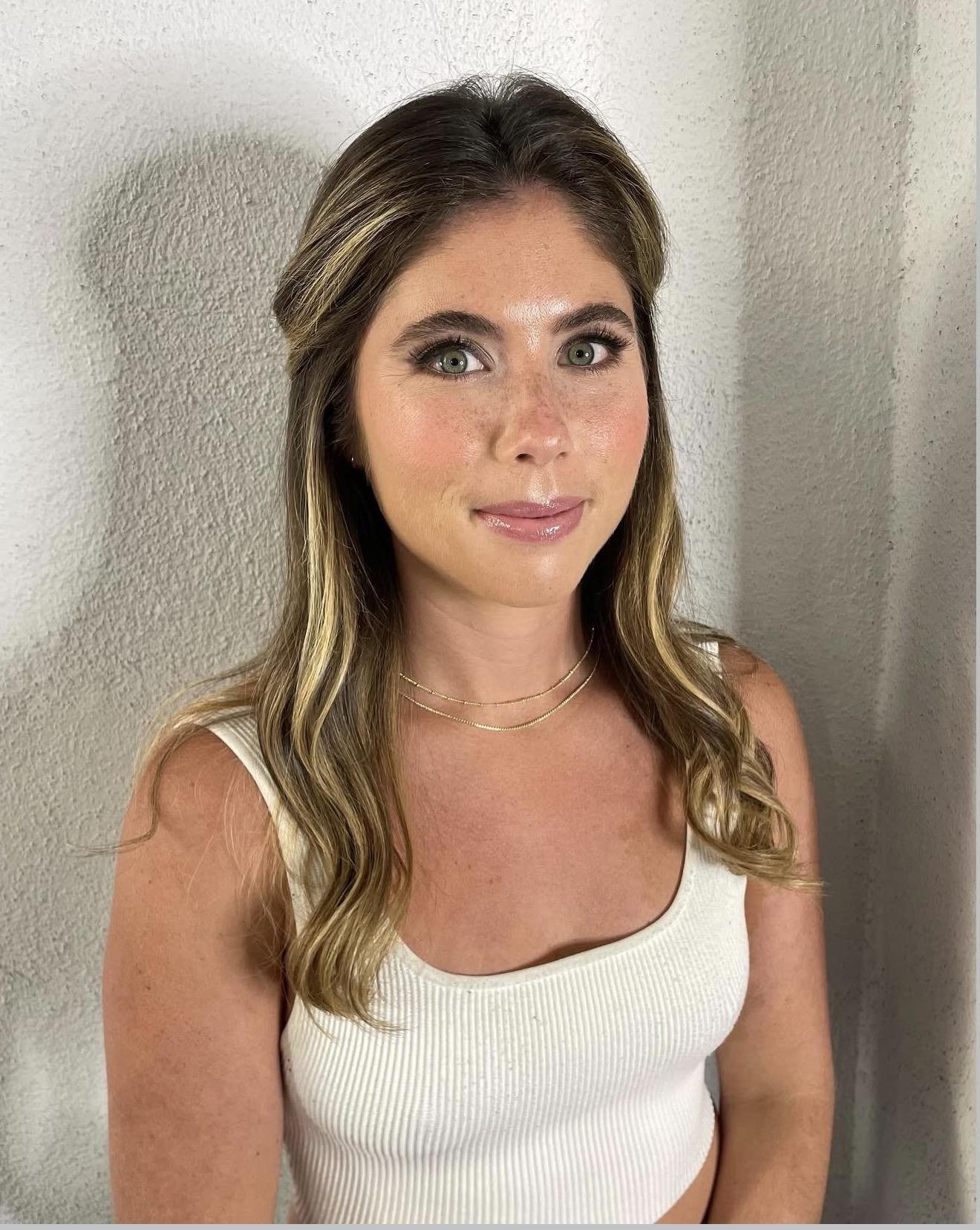 Los Angeles bridal makeup artist Jackie Romero creating soft glam wedding makeup for a bride