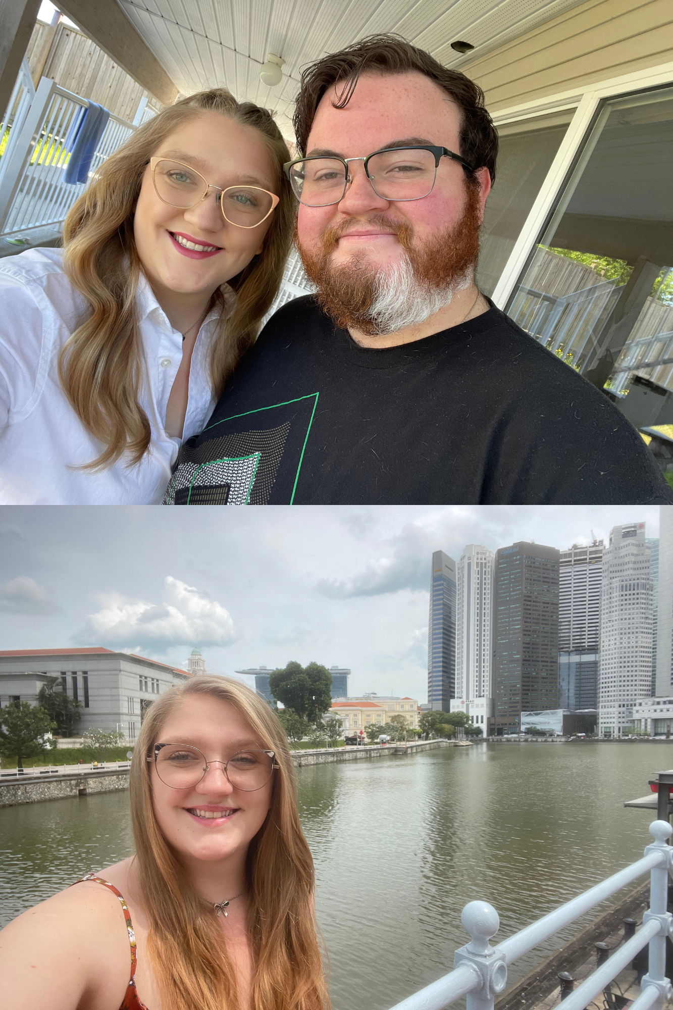 A smiling young woman with glasses and long hair taking a selfie outdoors by a waterway with city buildings in the background, under a partly cloudy sky.