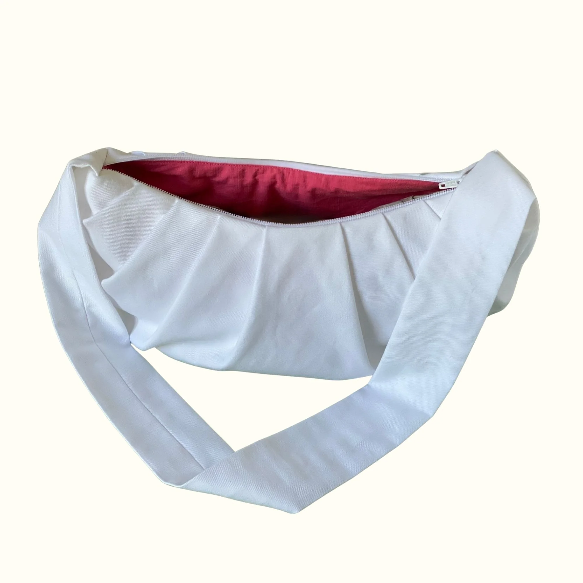 White croissant bag pink lining internal zip.jpg