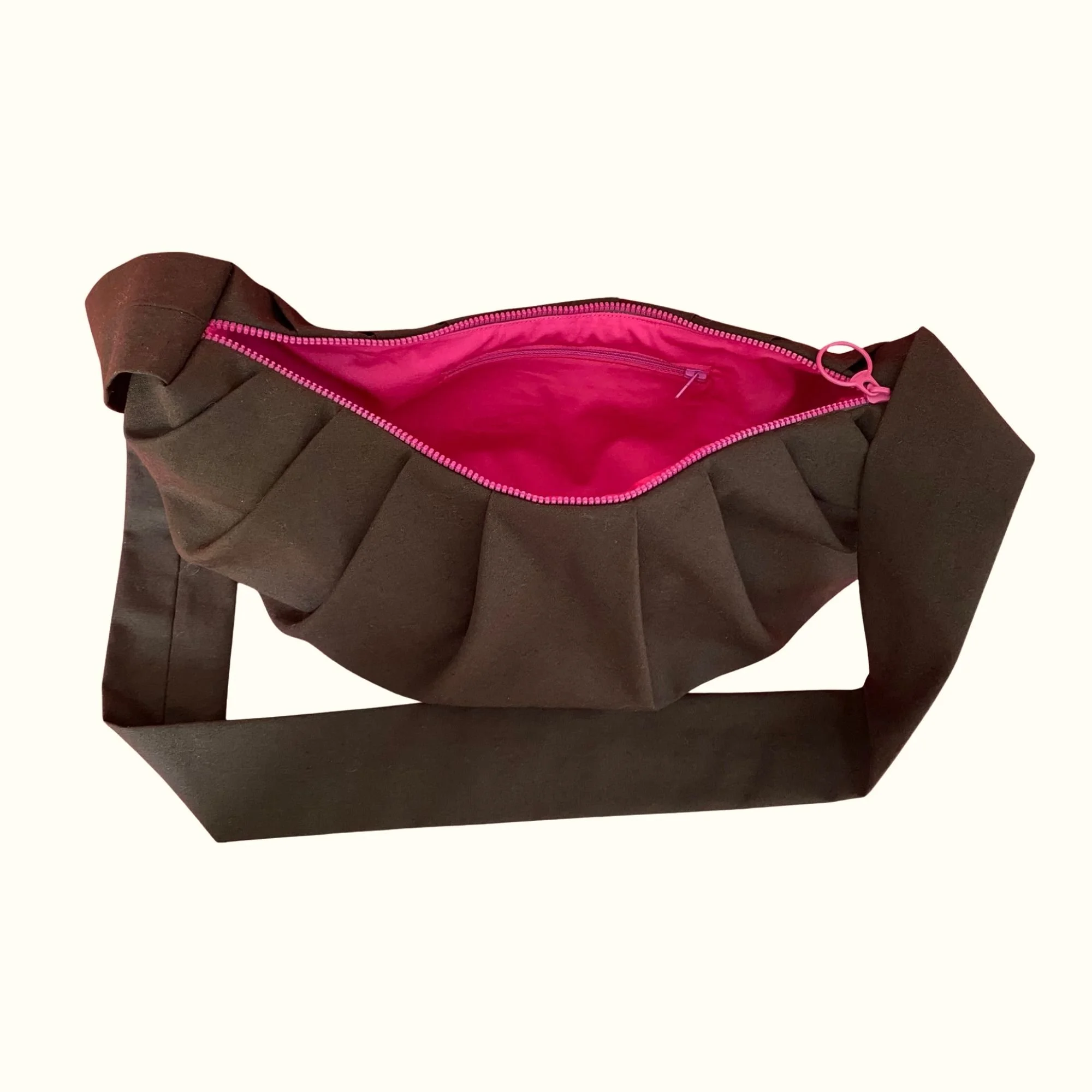 Brown croissant bag pink lining internal zip.jpg