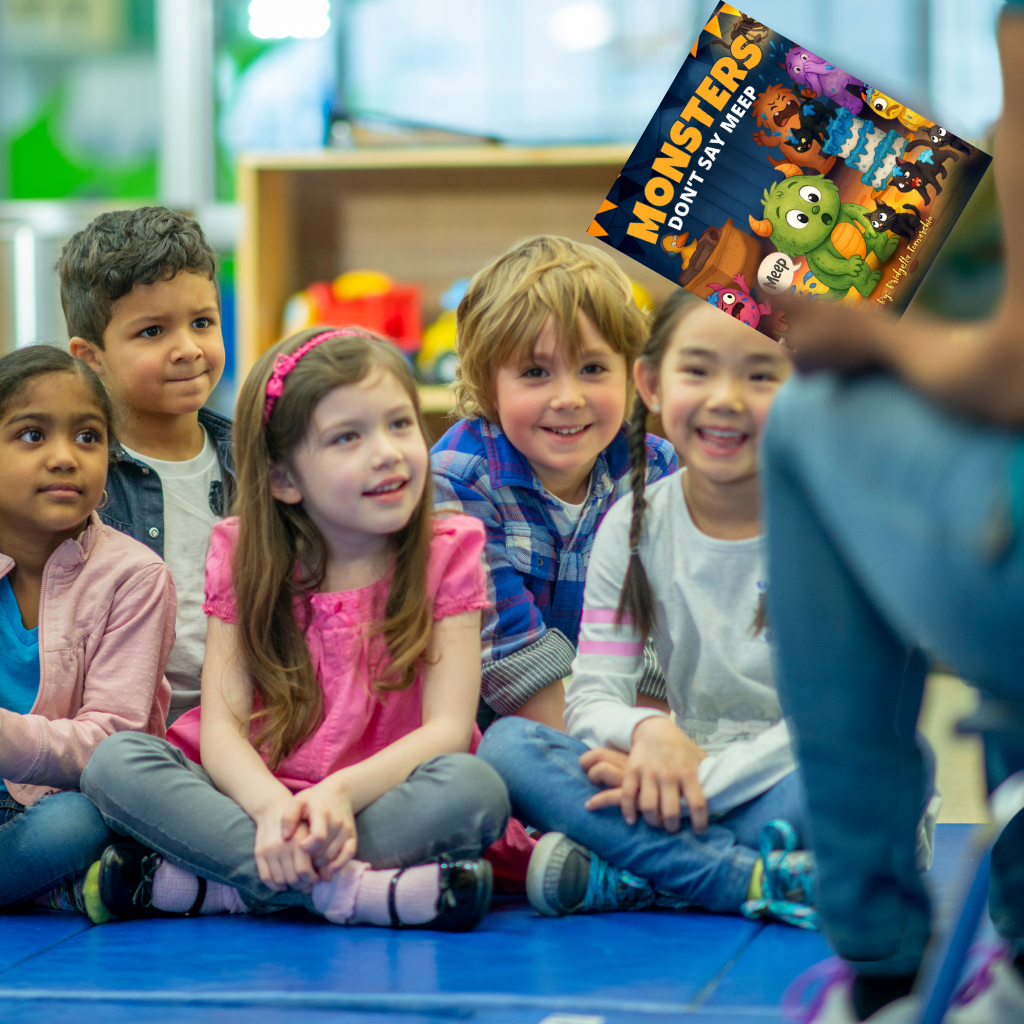 Group of young children sitting on the floor, attentively listening to a person holding a Monster Hunters book.