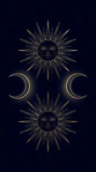 Sun and moon themed wall art with two sun faces and two crescent moons against a dark background.