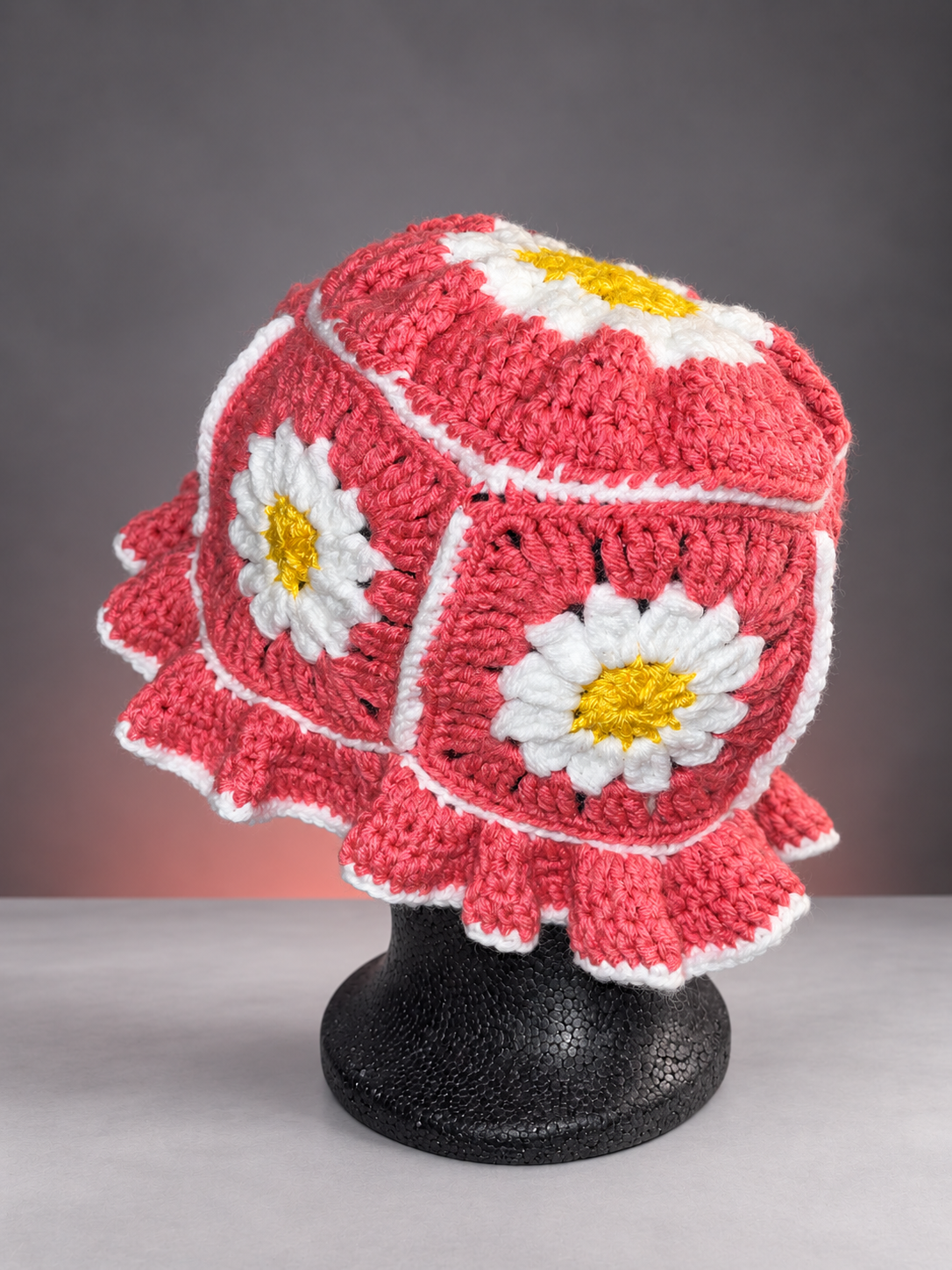 Crochet daisy hat on black mannequin-4.png