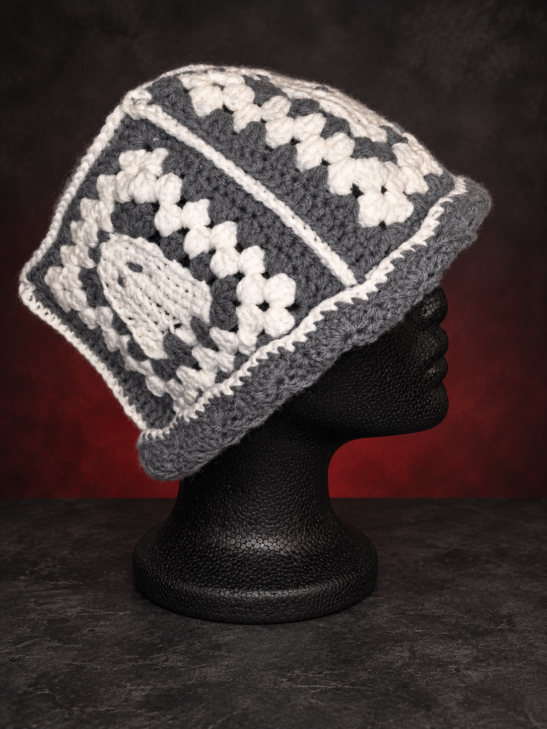 Gray-and-white crochet skull granny-square hat.png (Copy)