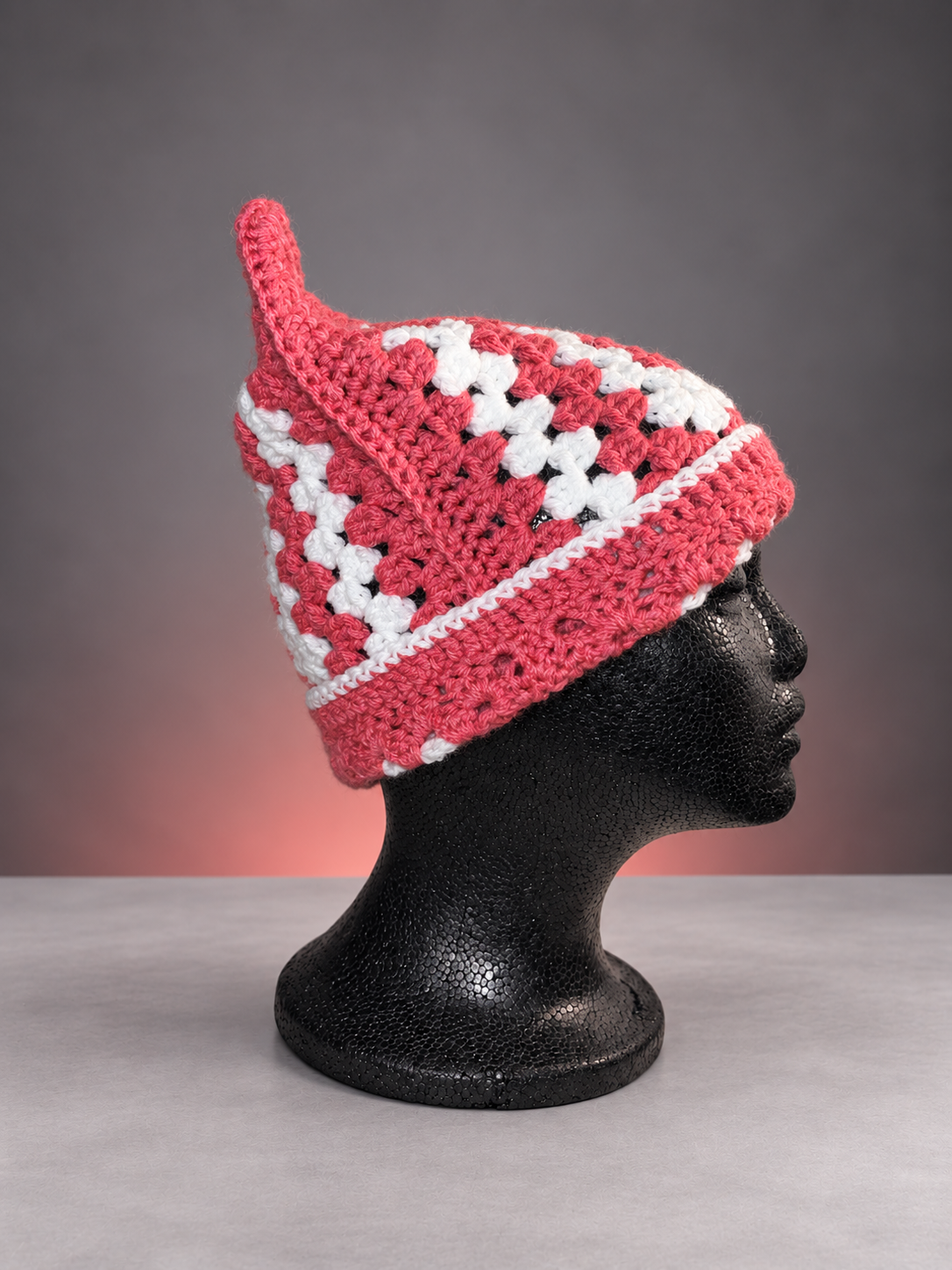 Pink and white granny-square ear beanie-3.png