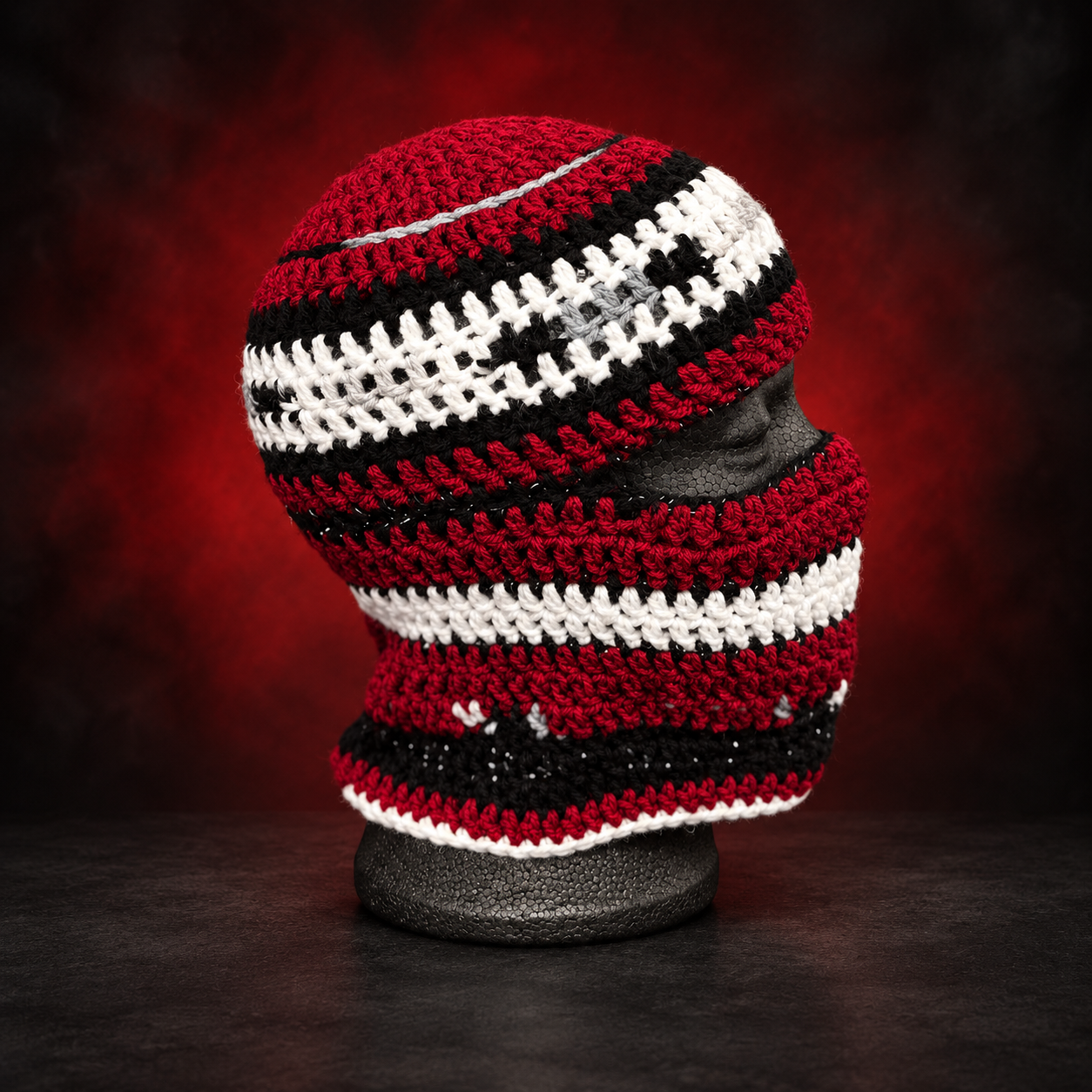 Handmade red, black, white and gray crochet ski-mask beanie. Wear it extended for face coverage or fold it up into a beanie. Two ways to wear it, your choice. Crafted Different. Worn Bold.