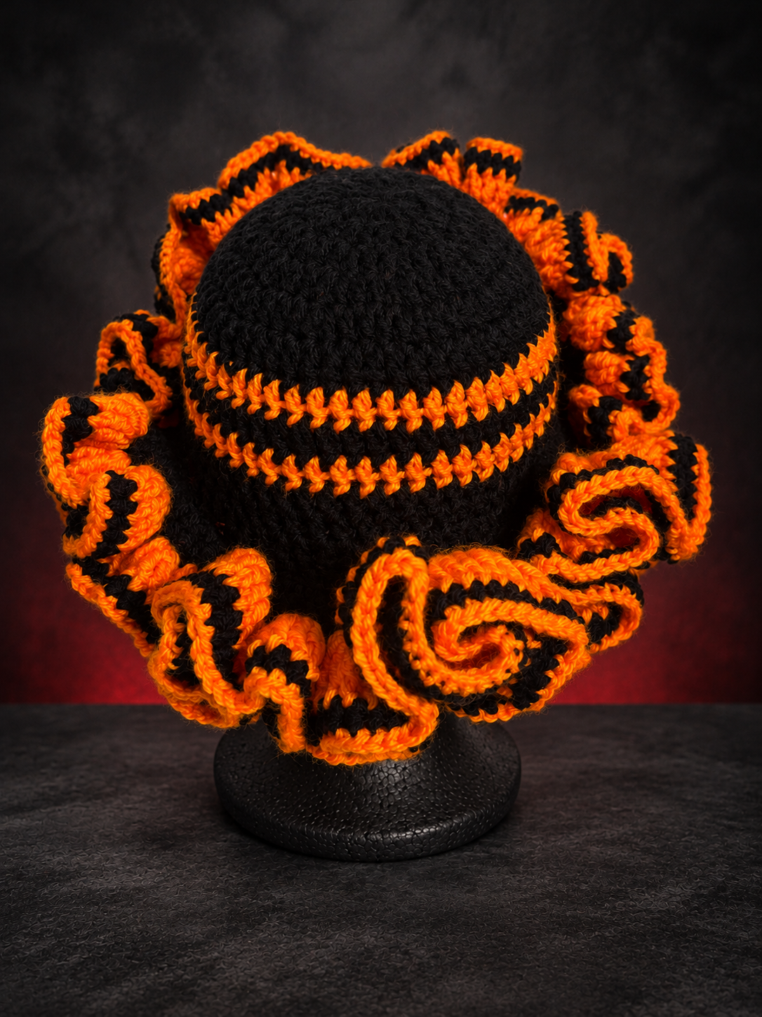 Orange-Black Crochet Hat in Moody Studio.png