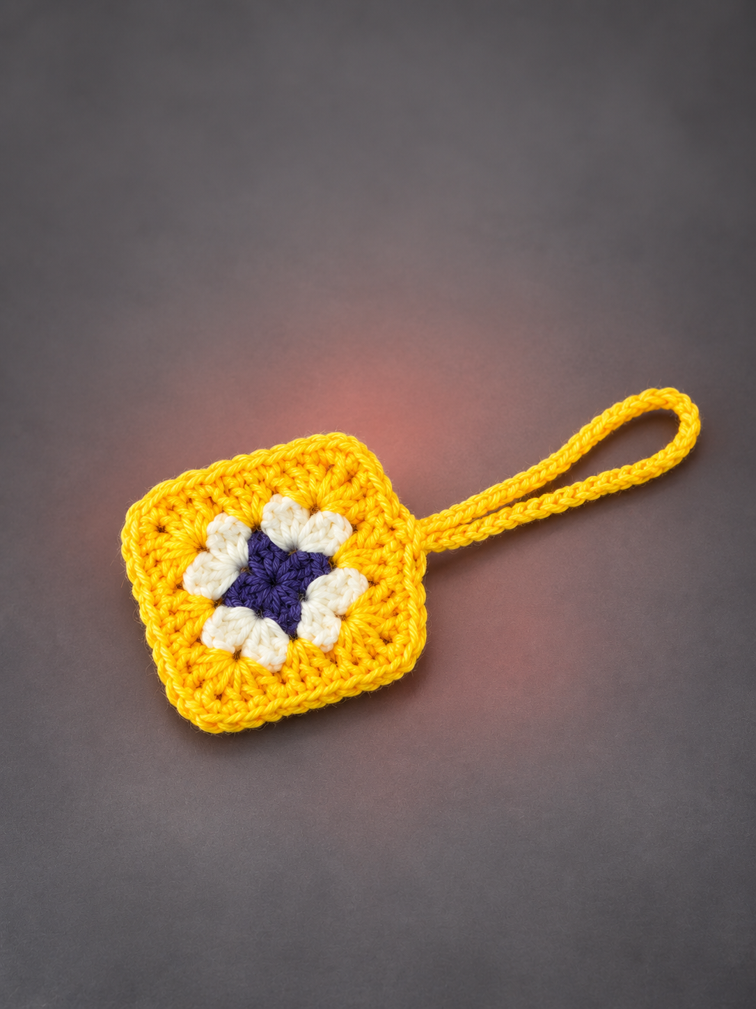 Yellow-bordered floral crochet earbud pouch-3.png