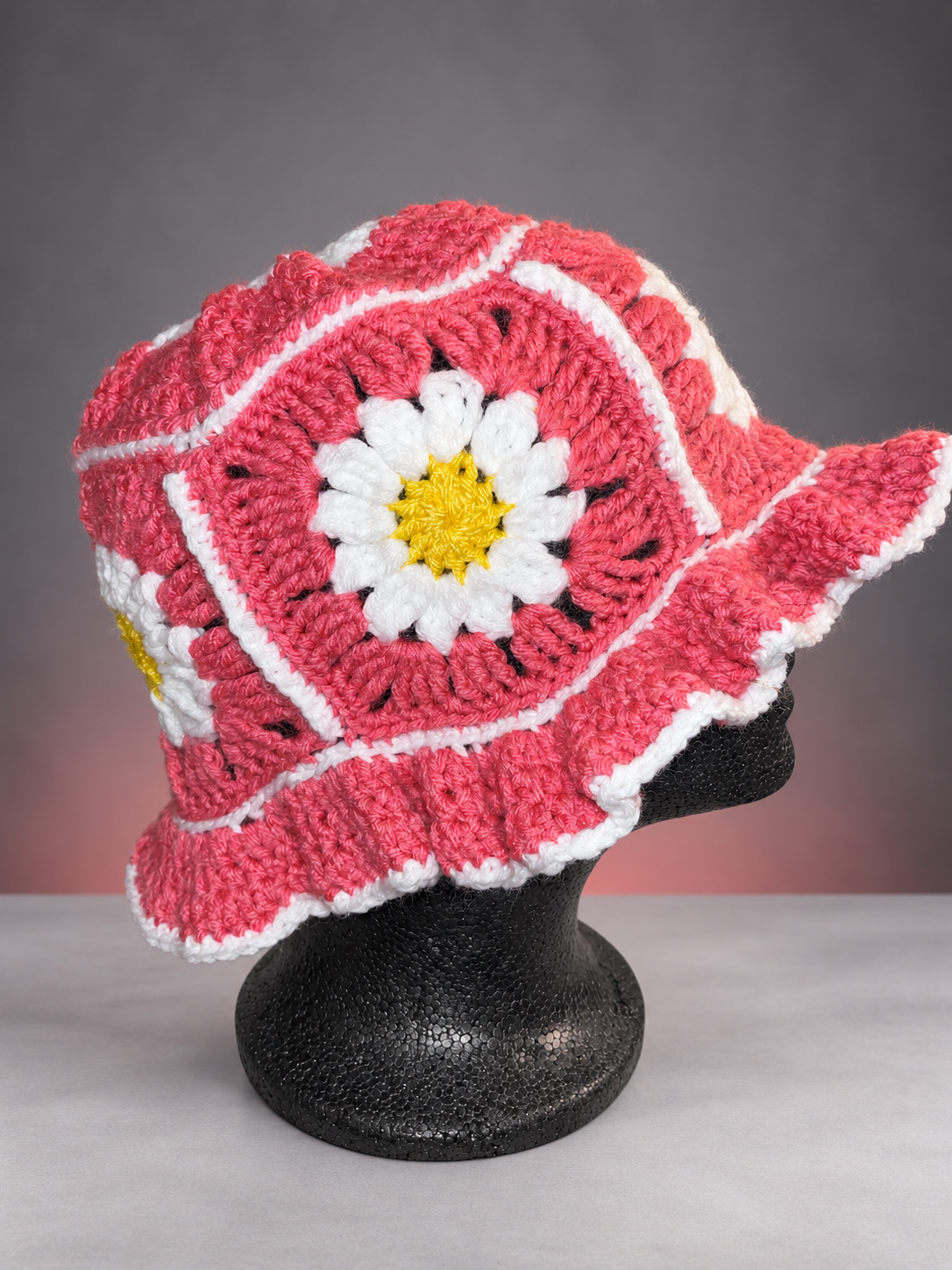 Daisy granny square hat on mannequin-1.png