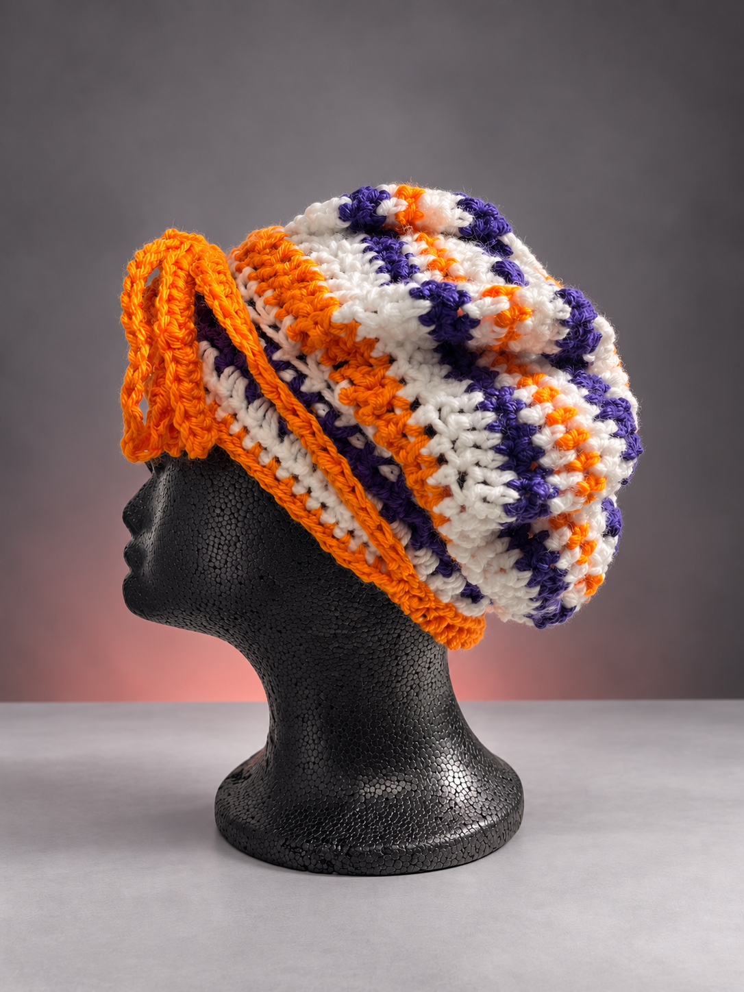 Handmade crochet bonnet on black mannequin-3.png