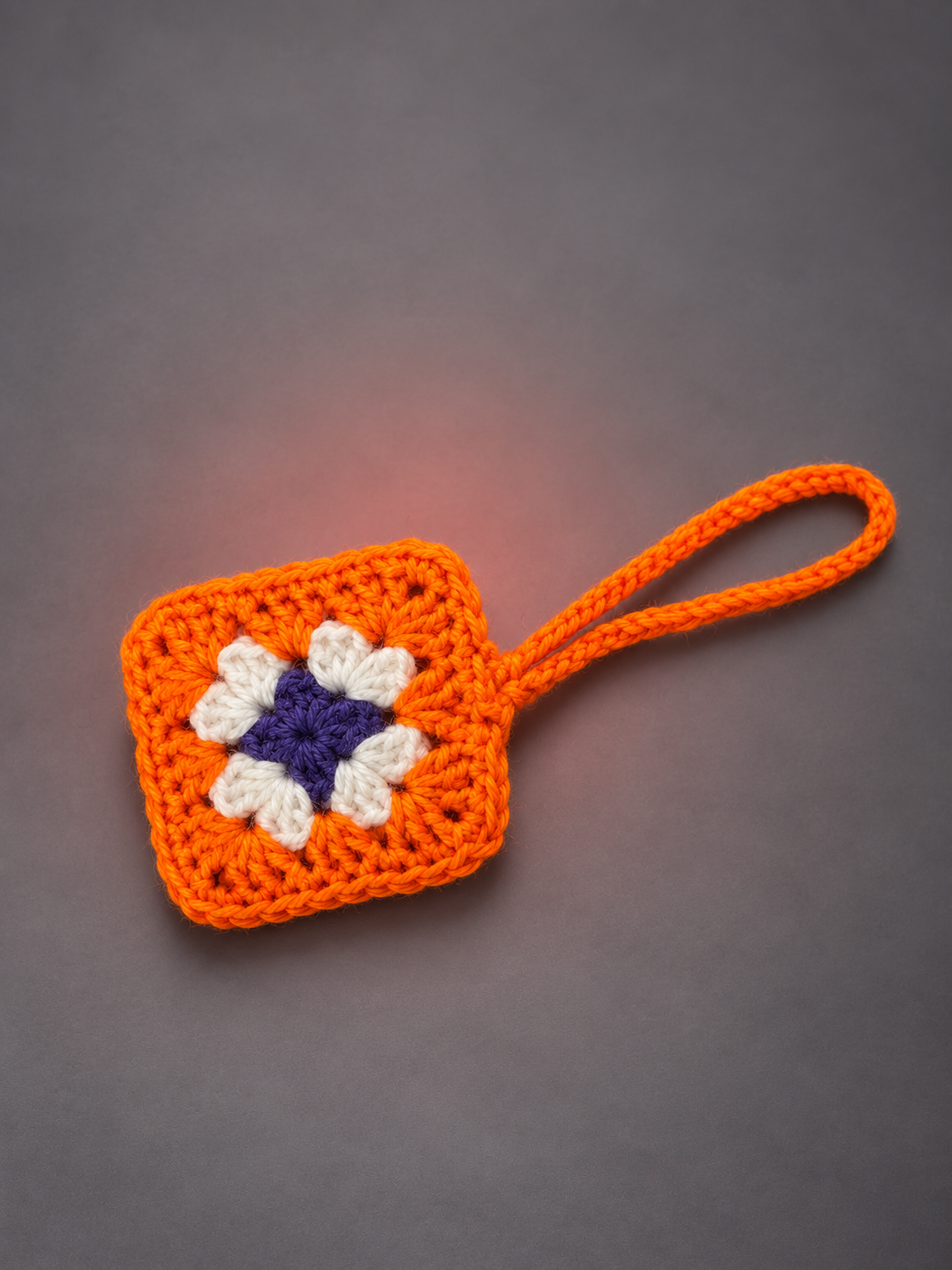 Orange-bordered floral crochet earbud pouch-5.png
