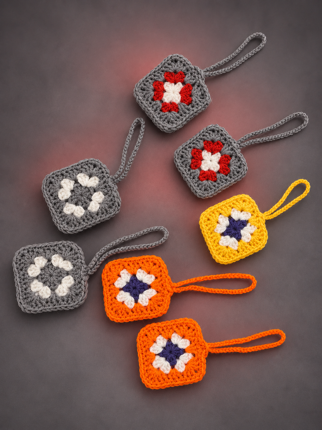 Seven handmade crochet earbud pouches-1.png