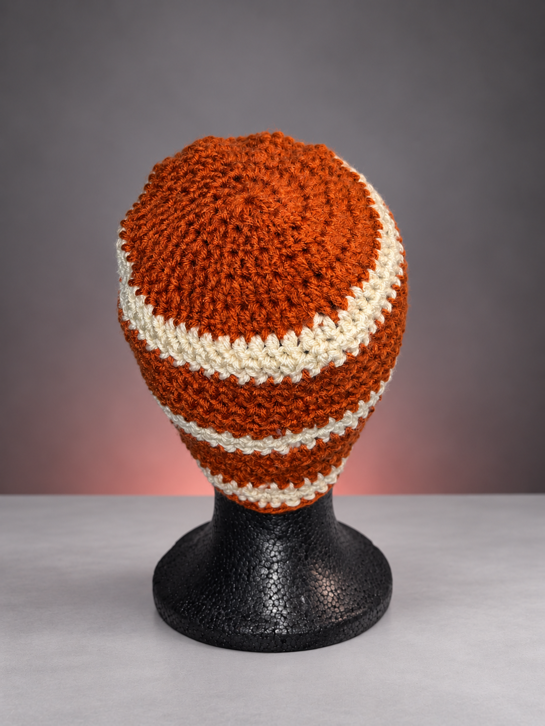 Rust and cream striped crochet beanie.png