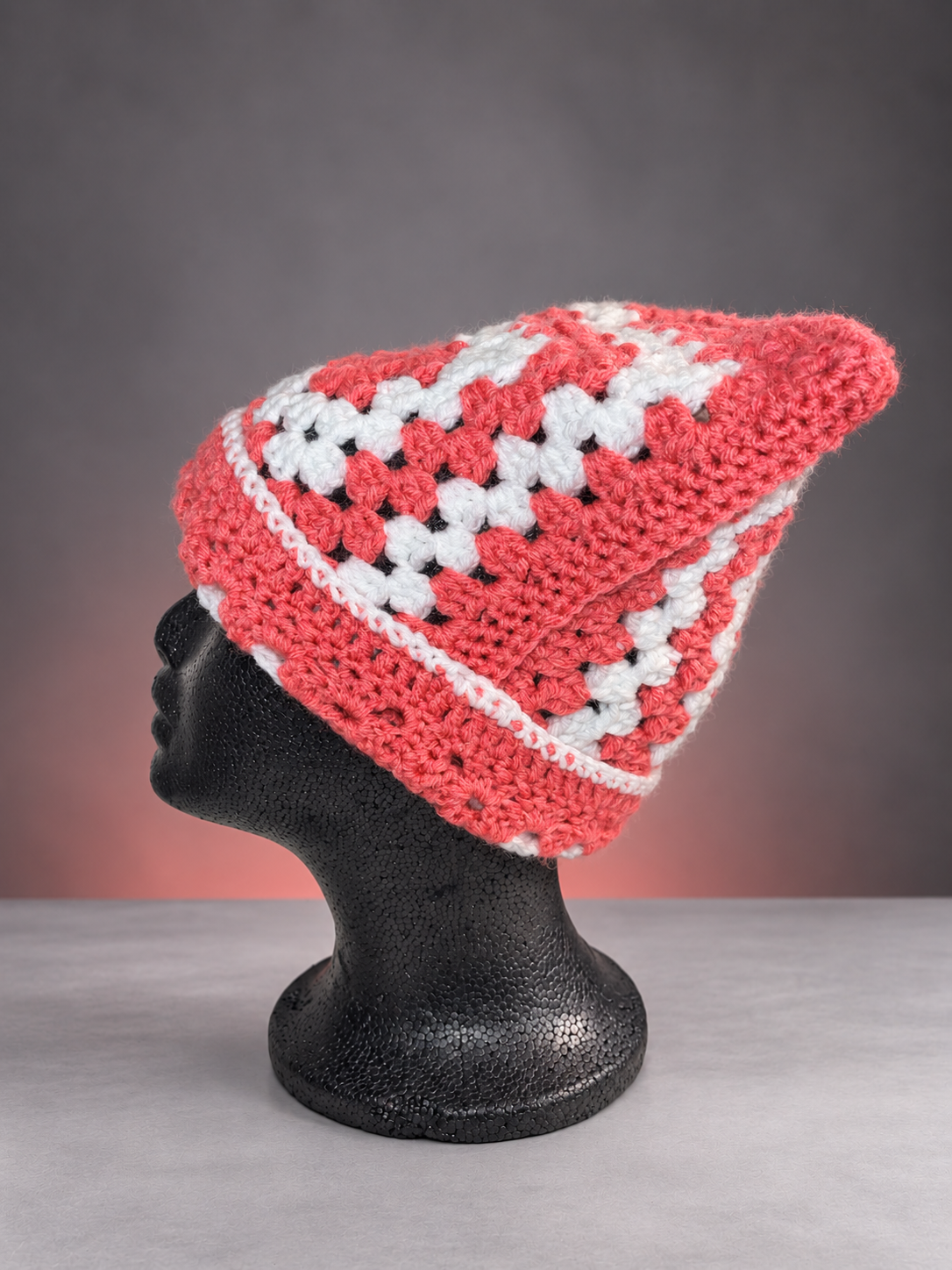 Pink and white granny-square ear beanie-2.png