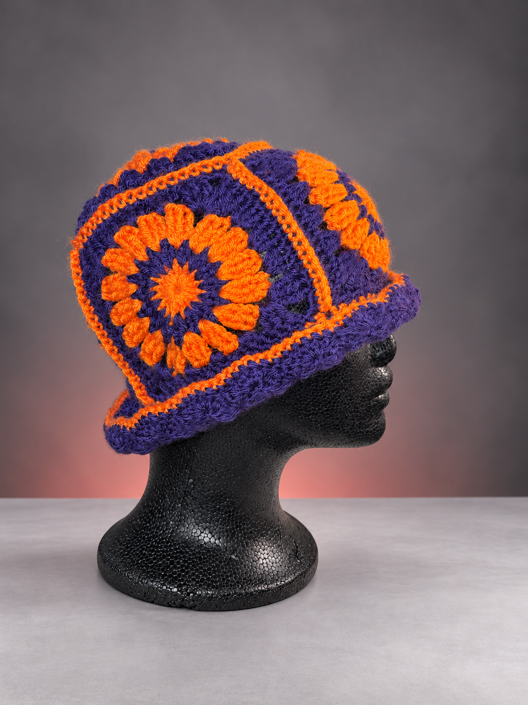 Purple and orange granny-square flower hat-3.png