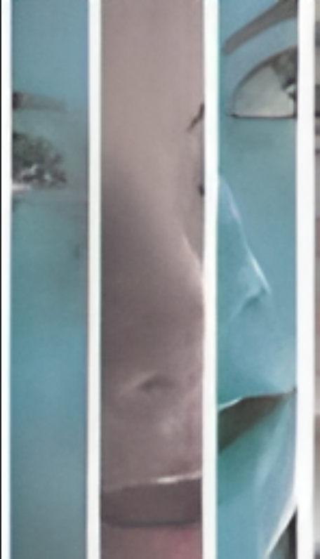 A mirror door reflecting a room with turquoise walls and a shower curtain.