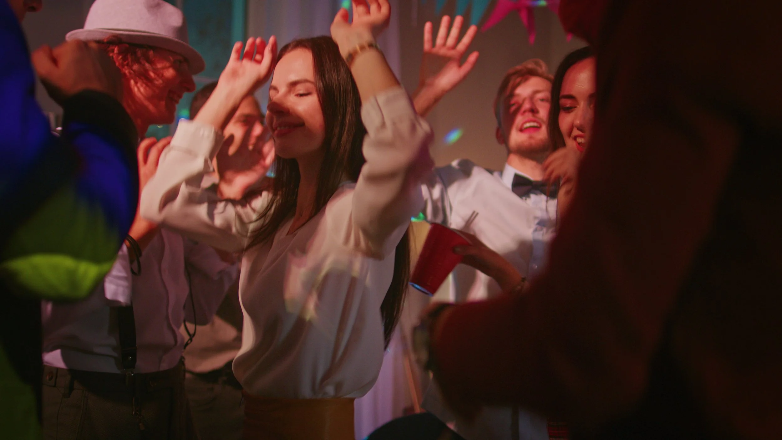 at-the-house-party-diverse-group-of-friends-have-fun-dance-jump-socialize-stylish-youn-SBI-357592978.jpg
