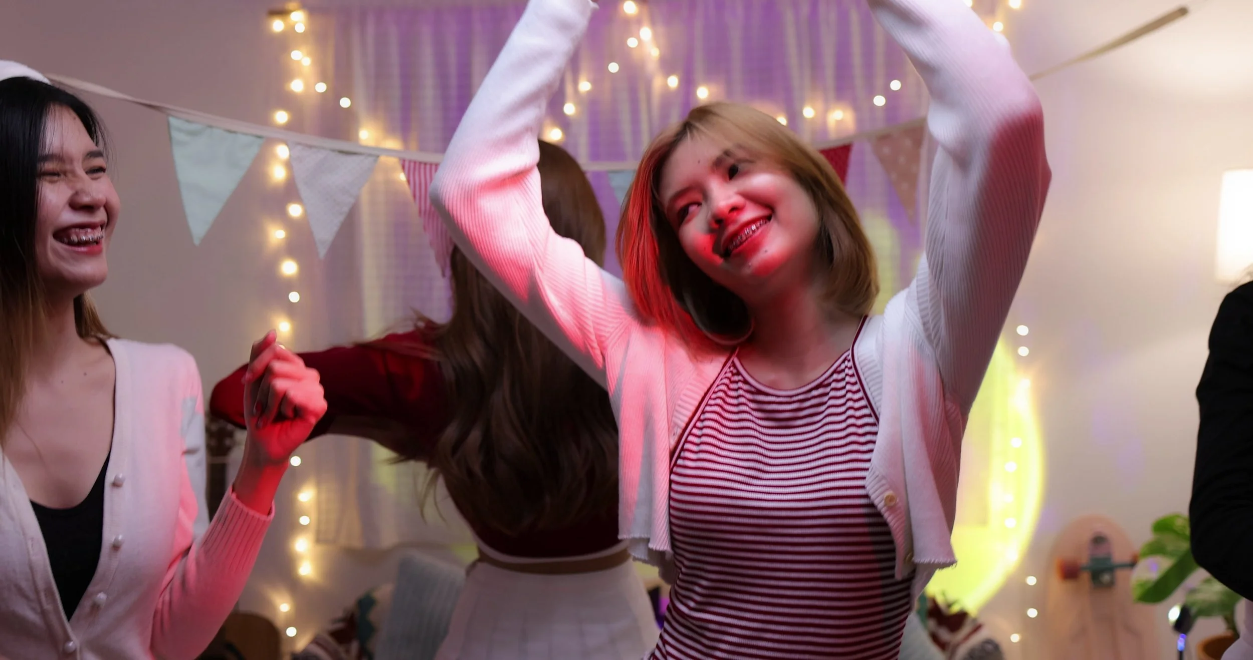 diverse-group-of-asian-college-student-friends-have-fun-dancing-and-socializing-with-d-SBI-350529468.jpg