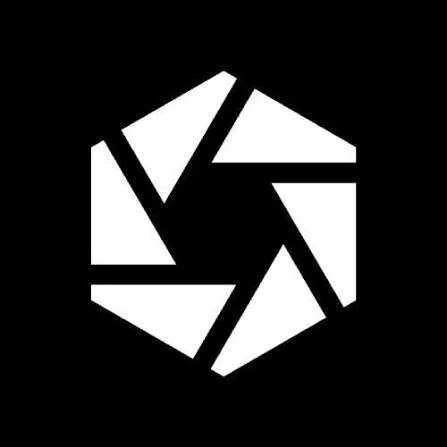 Black background with a white geometric hexagon composed of six camera shutter blades.