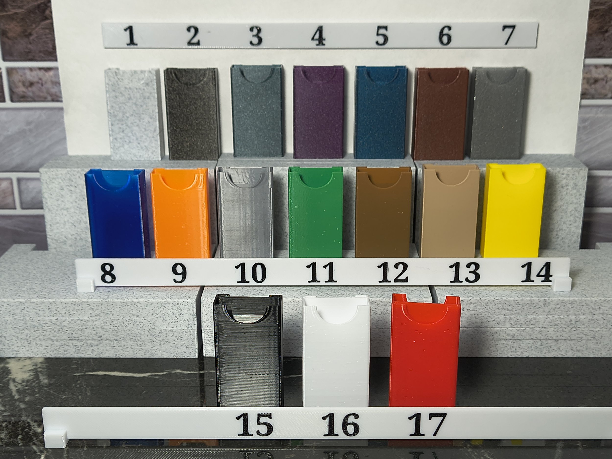 Color code of available colors, colored razor blade banks on shelves.