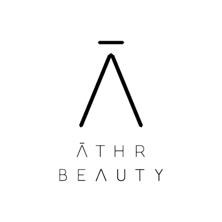 Logo for Áther Beauty with stylized letter 'A' and the brand name below