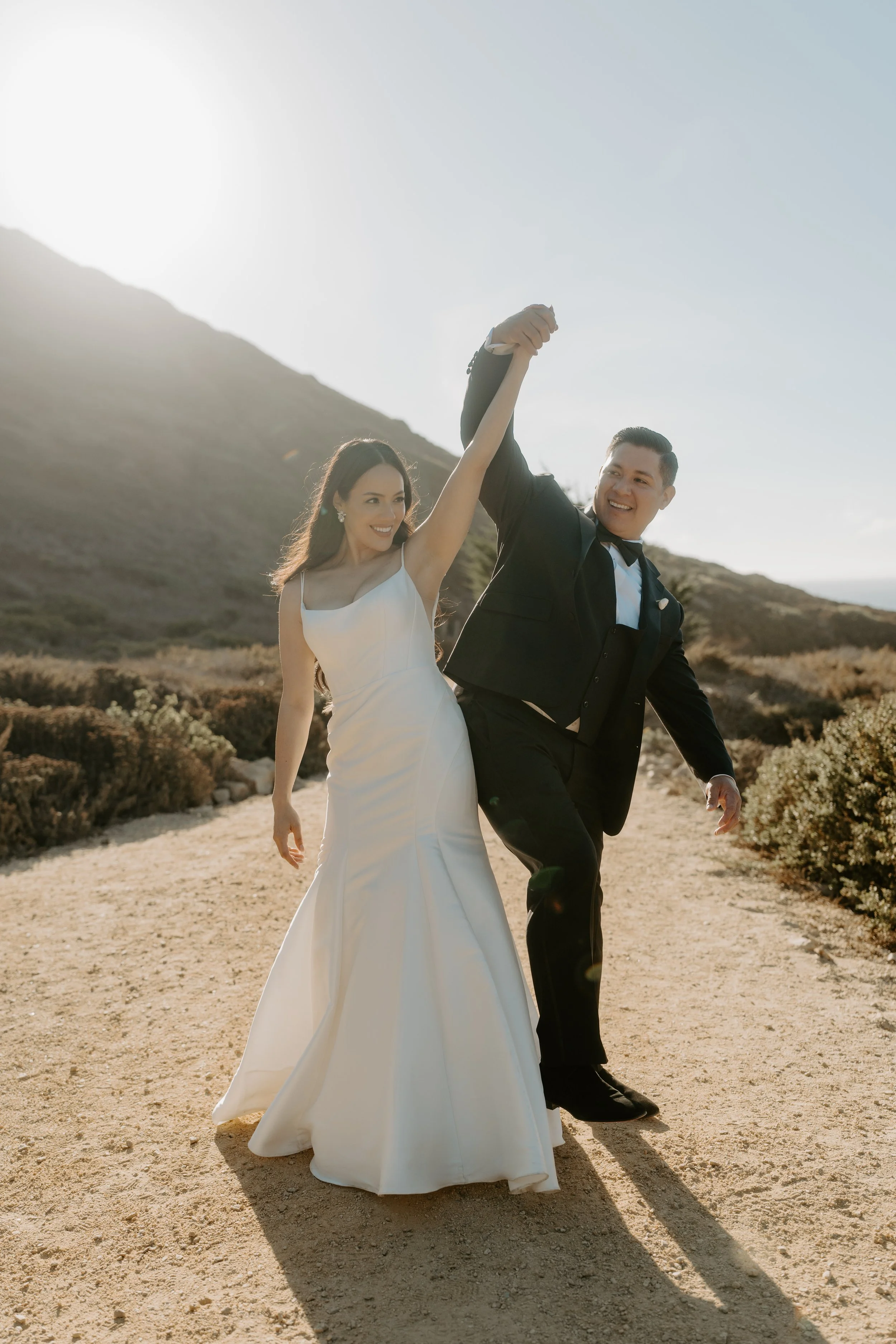 a bride and groom celebrating that they just got married.