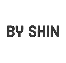 Text reading 'BY SHIN' in bold black letters on a white background