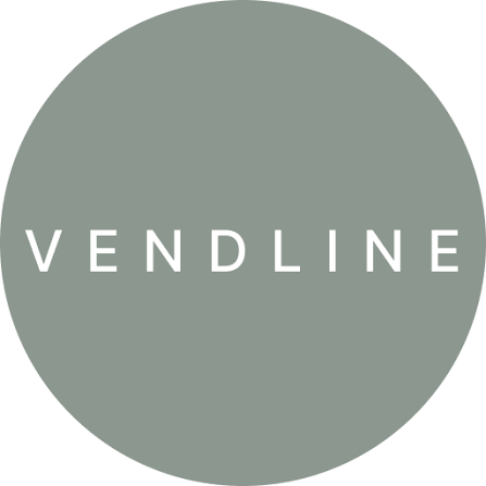 Grey circular logo with the word 'VENDLINE' in white uppercase letters.