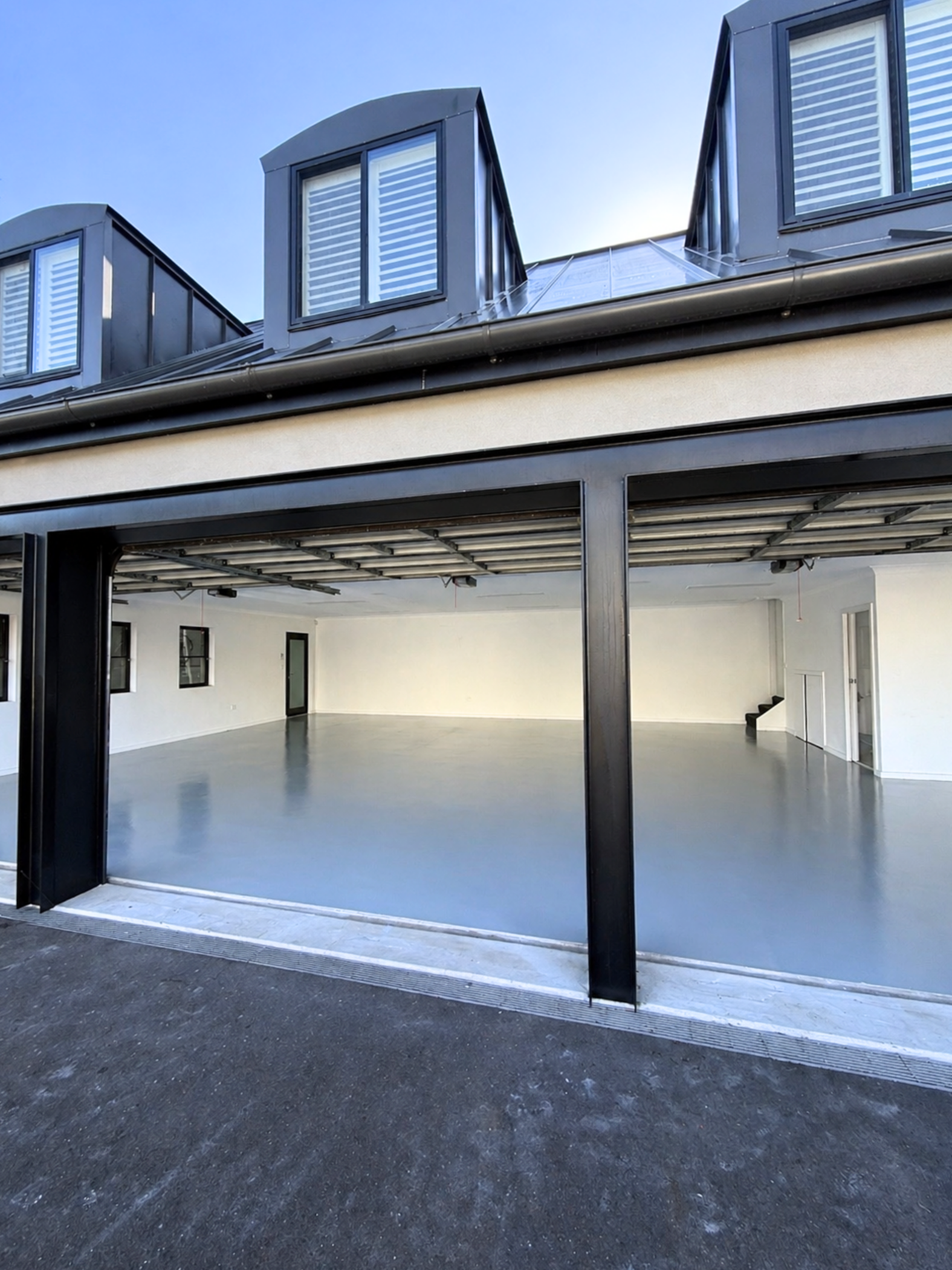 Epoxy coated garage floor in a Sydney residential car park, by PQC Painting Solutions