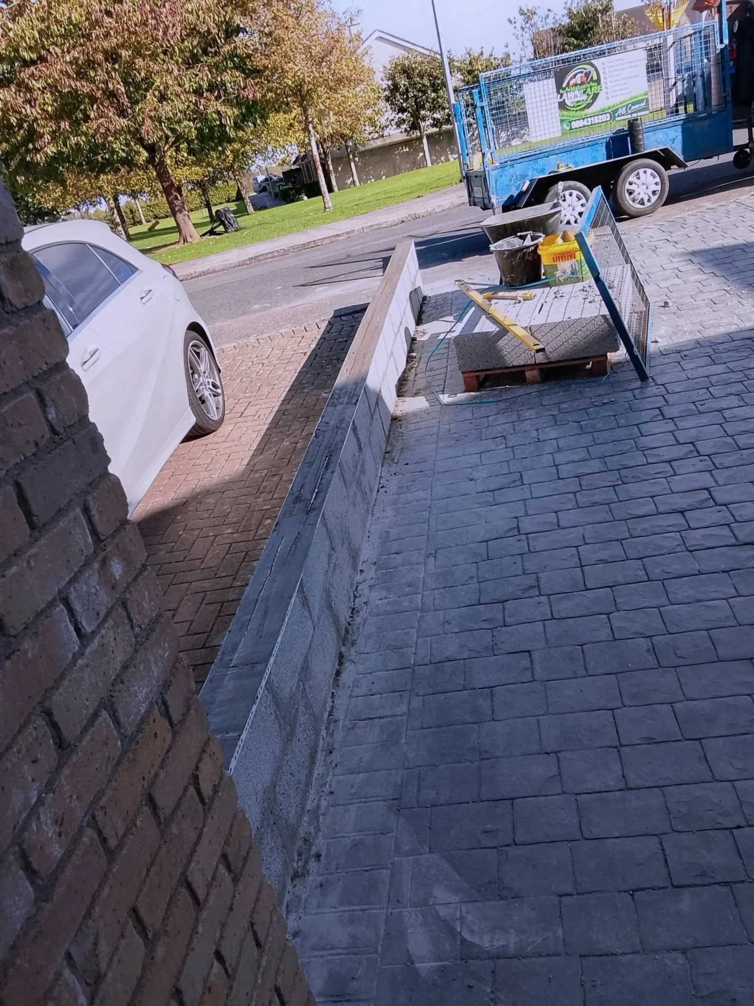 Oranssi technician working on a roof project