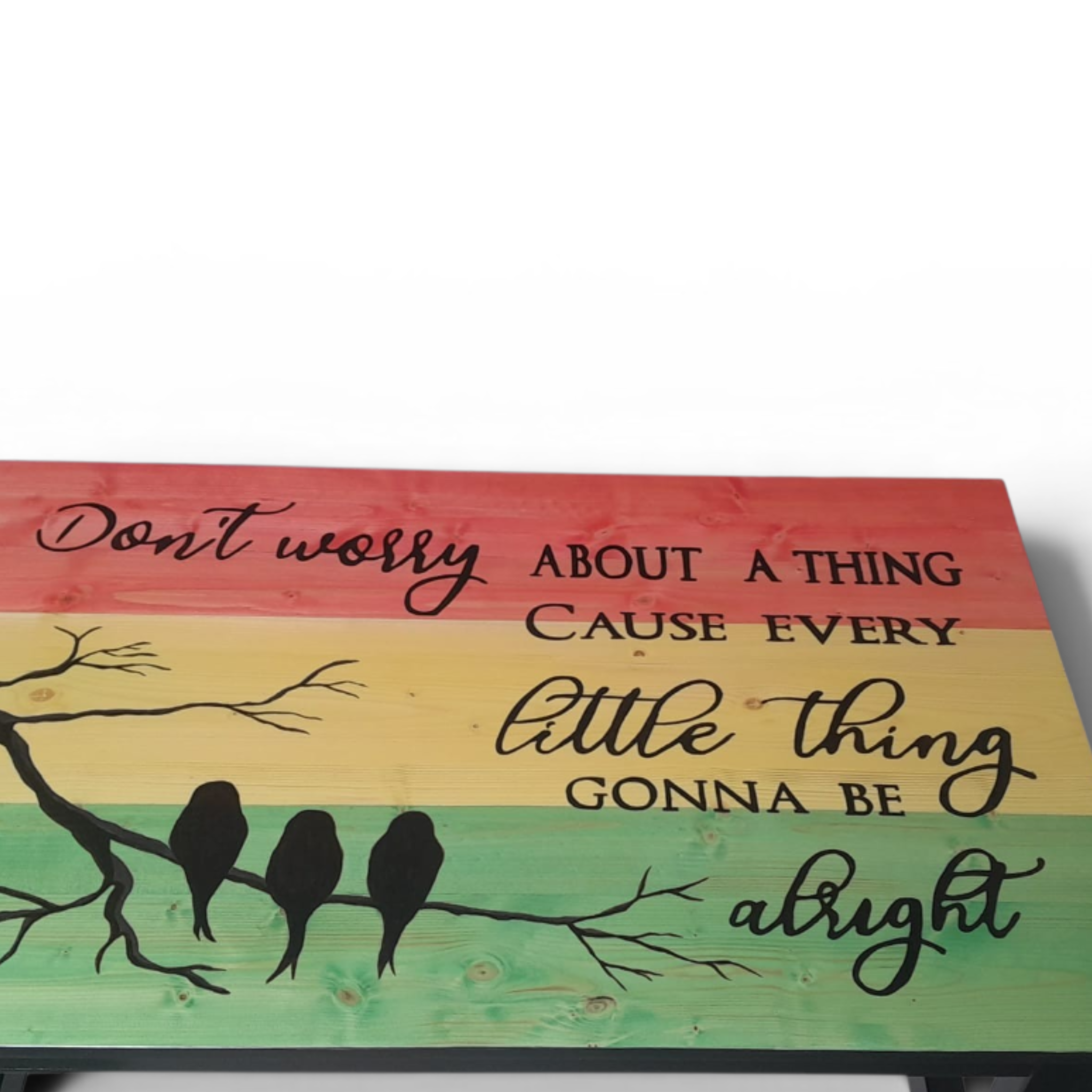 Bob Marley table – vibrant reggae colors and lyric design.