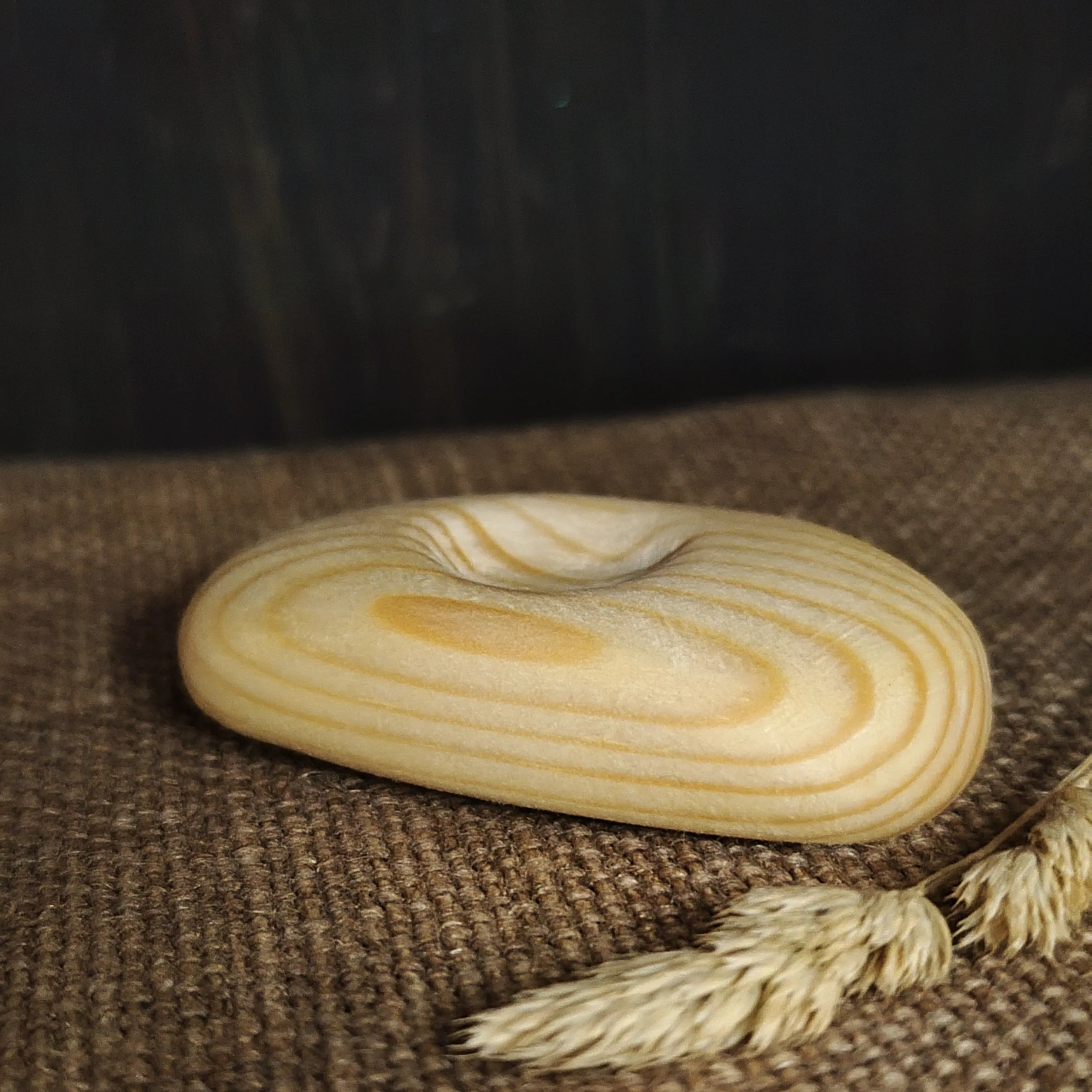 Quiet Bearer – Hand‑carved Irish pine palm piece (soft hollow for calm)