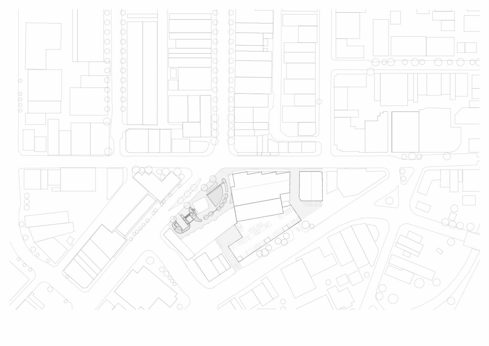 Architectural site plan with multiple buildings, parking lot, roads, and surrounding trees and landscape features.