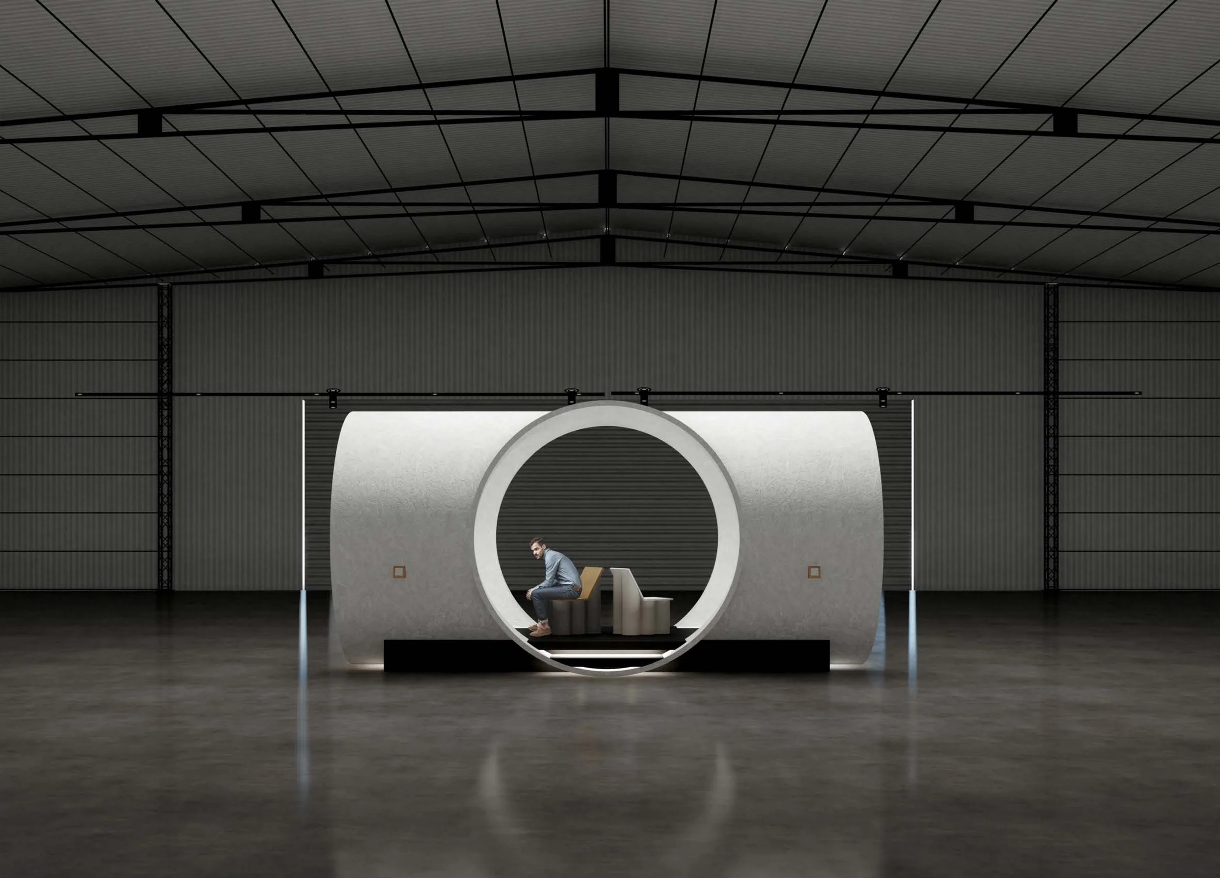A man sitting on a modern white and gray circular chair in a spacious industrial-style room with gray metal walls and high ceiling, capturing the scene's minimalistic and contemporary design.